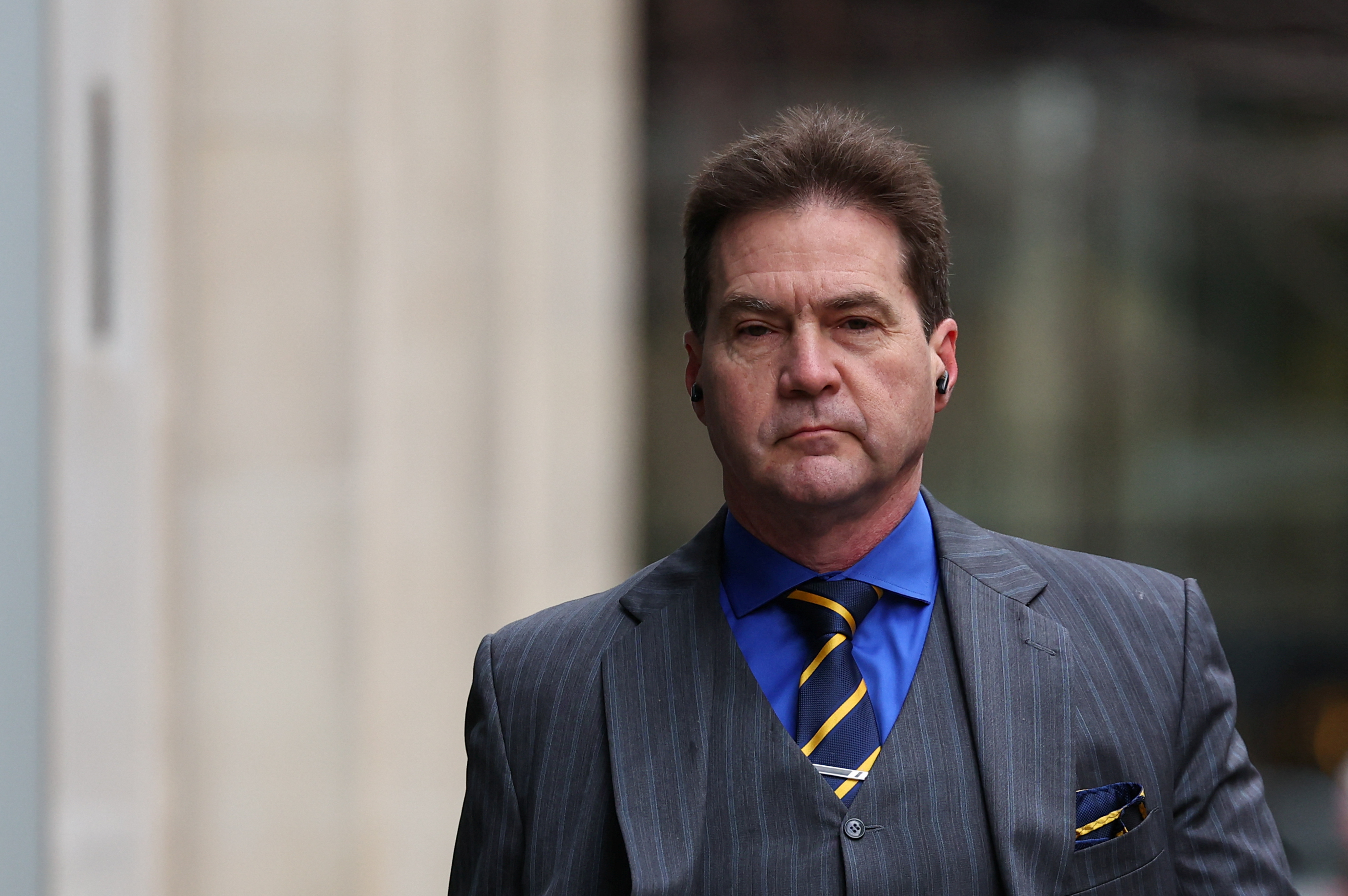 Australian computer scientist Craig Wright arrives at the Rolls Building of the High Court in London