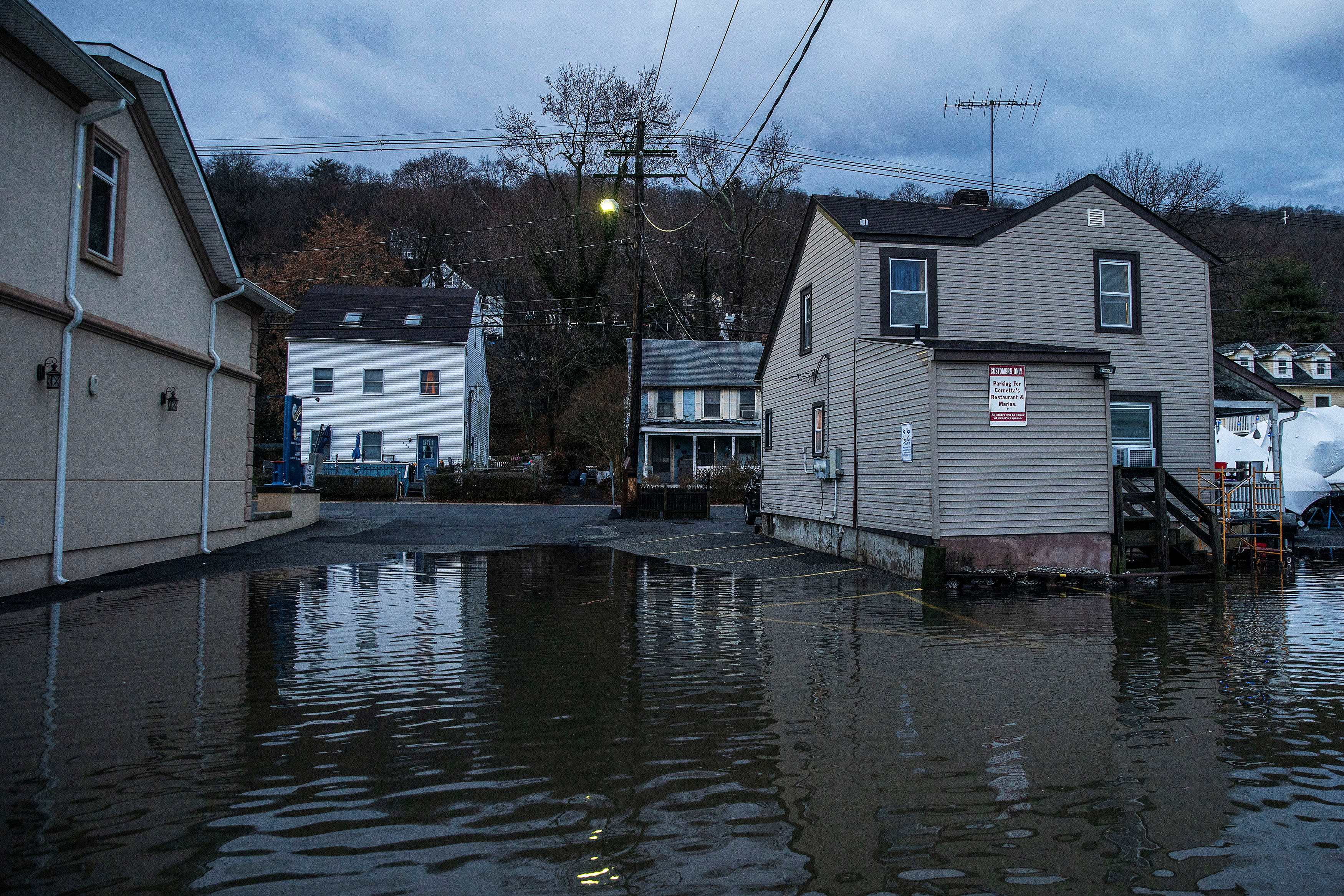 Winter storm along US East Coast leaves behind power outages, flooding ...