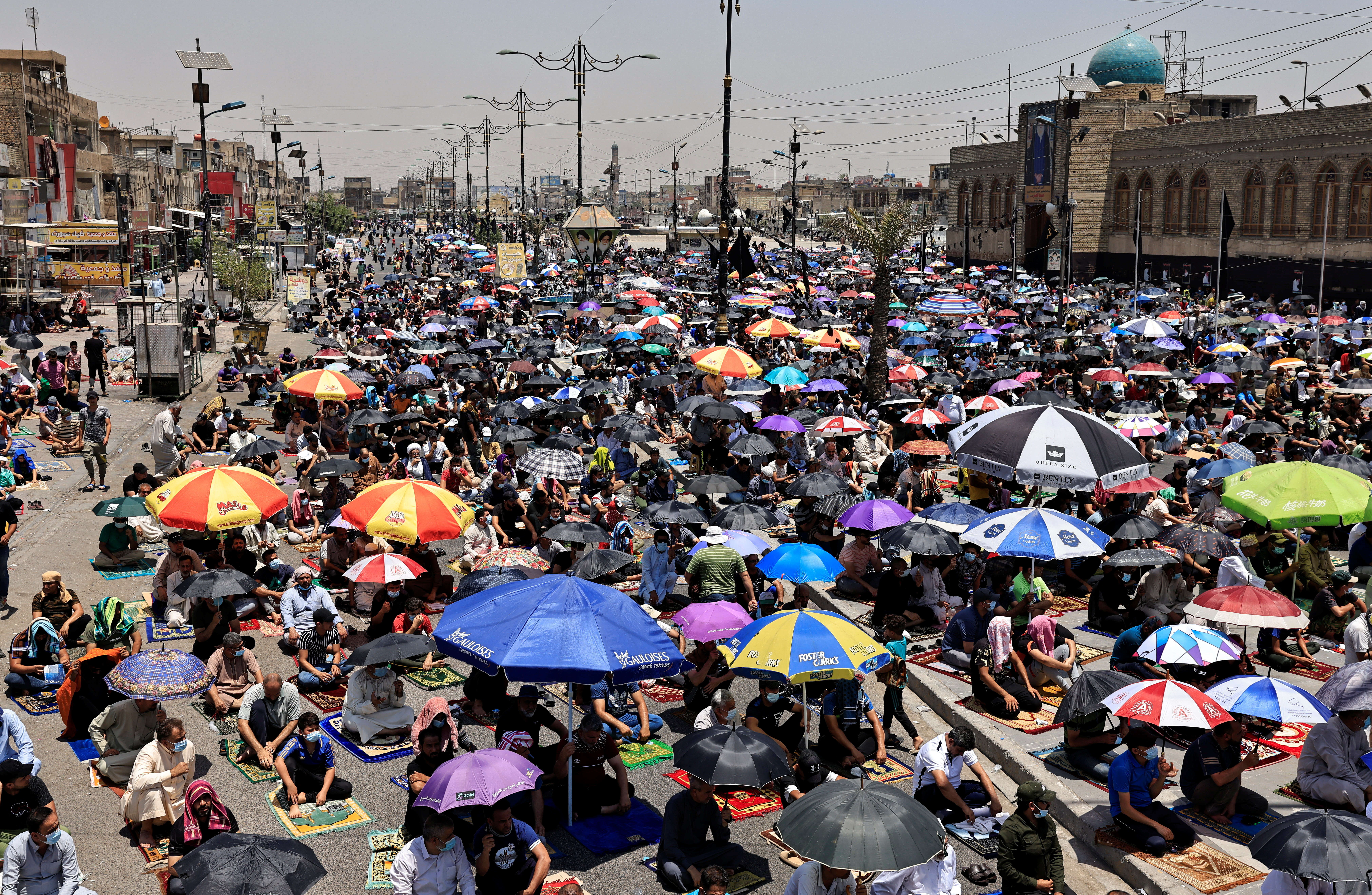 Supporters of Iraqi Shi'ite cleric Moqtada al-Sadr attend Friday prayers in Baghdad