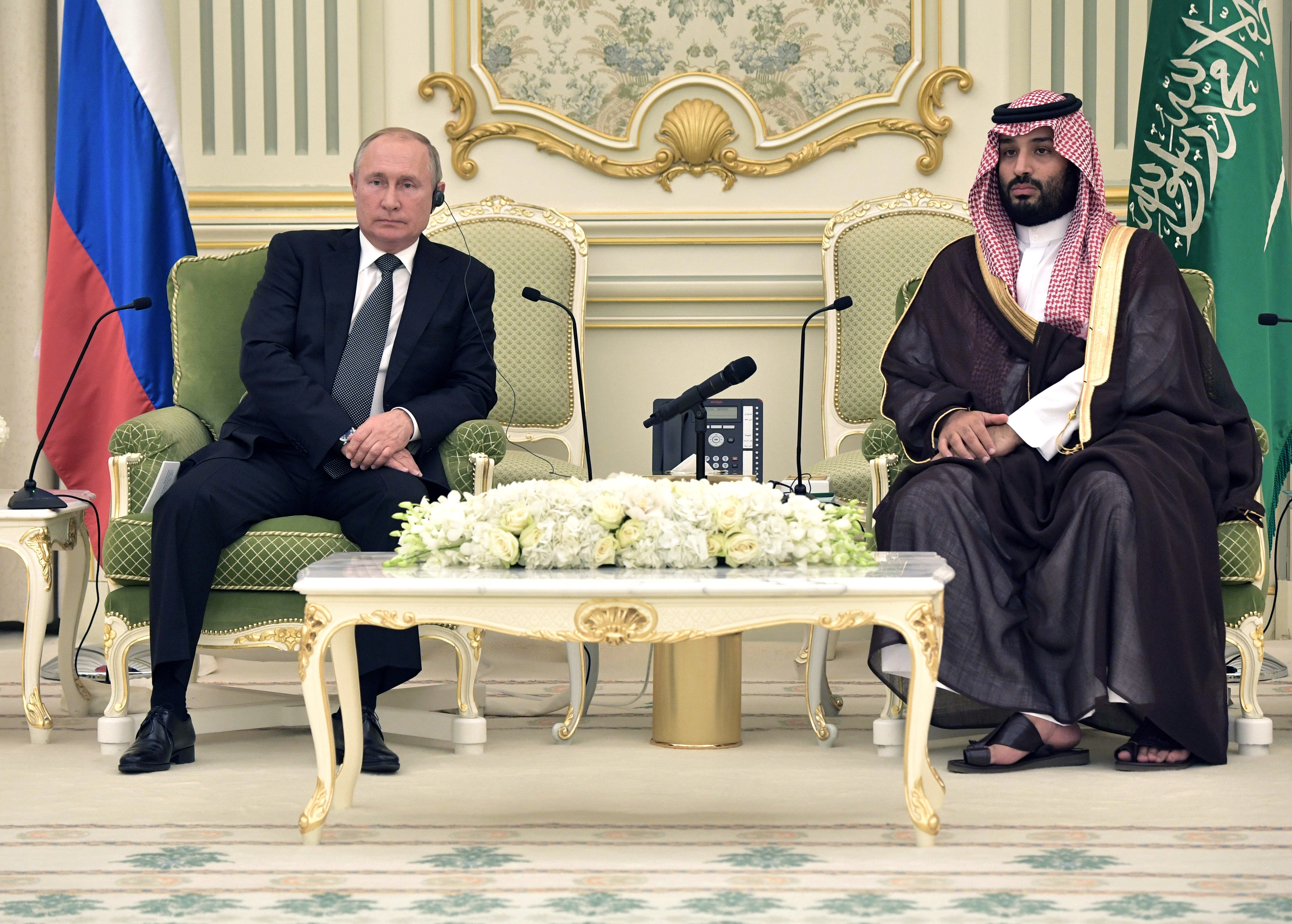 Russian President Vladimir Putin and Saudi Arabia's Crown Prince Mohammed bin Salman attend a meeting in Riyadh