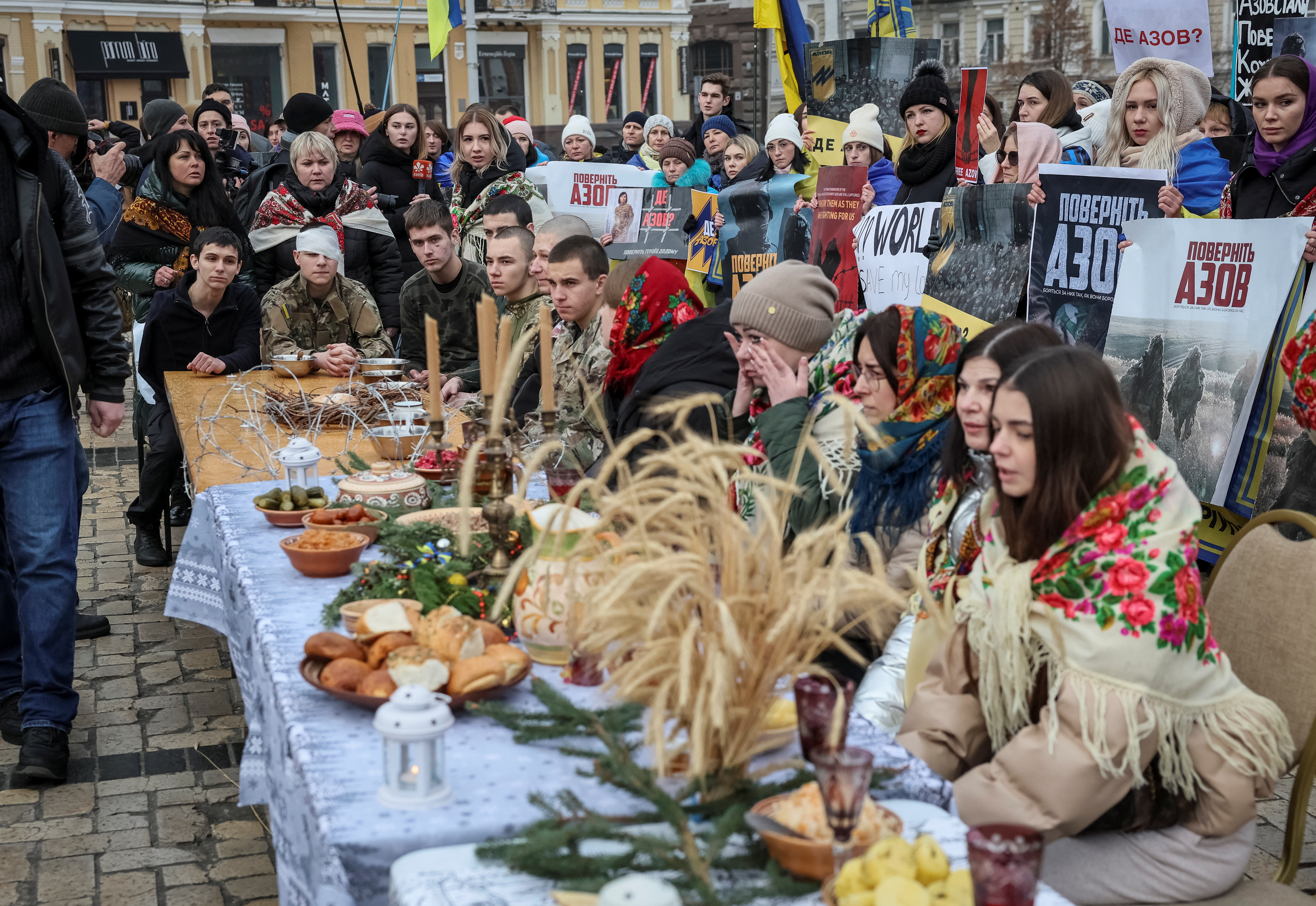 Relatives and supporters of Ukrainian prisoners of war from of the Azov regiment attend a performance demanding to speed up their release from a Russian captivity in Kyiv