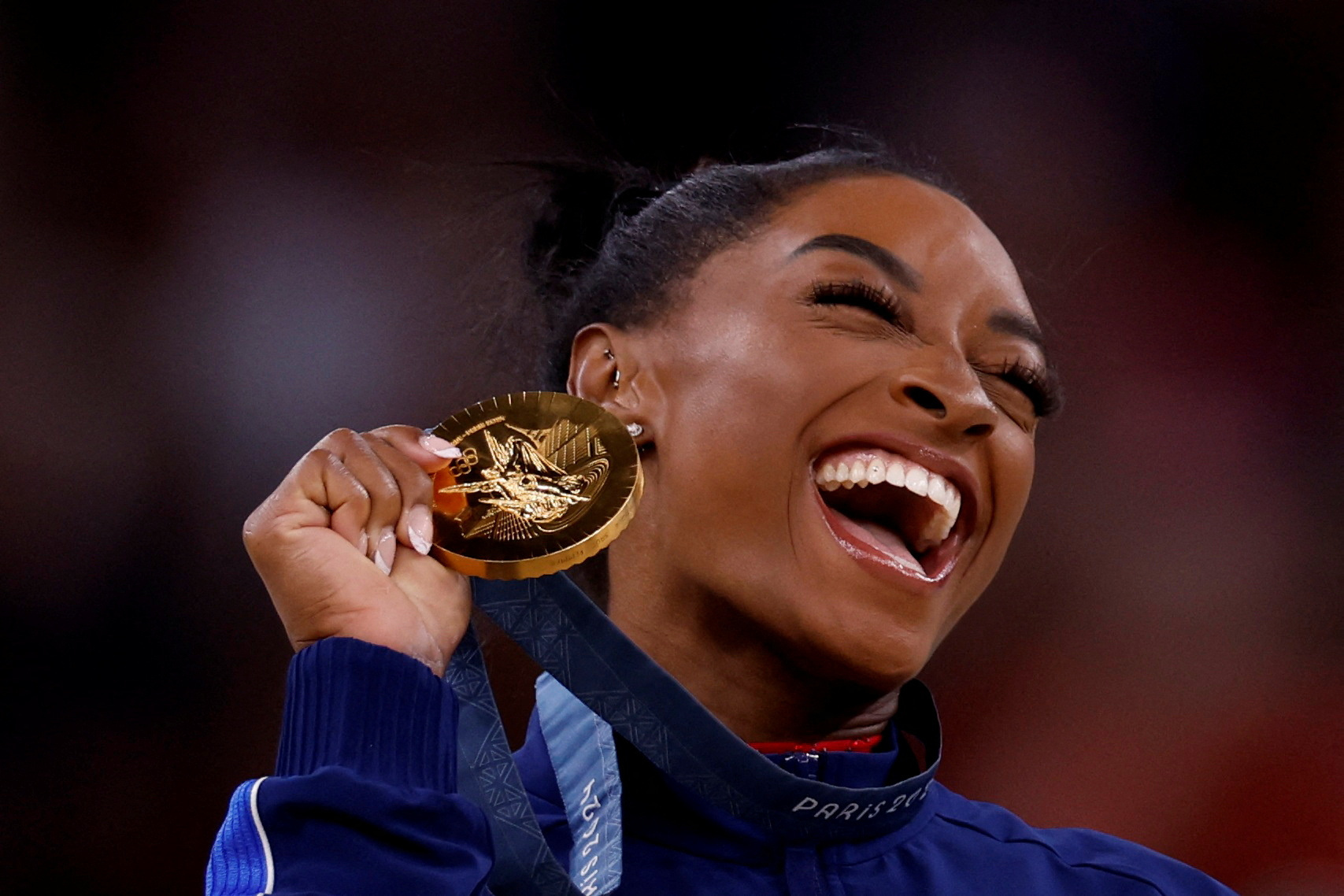 Biles shushes Tokyo critics with three gold medals so far in Paris | Reuters