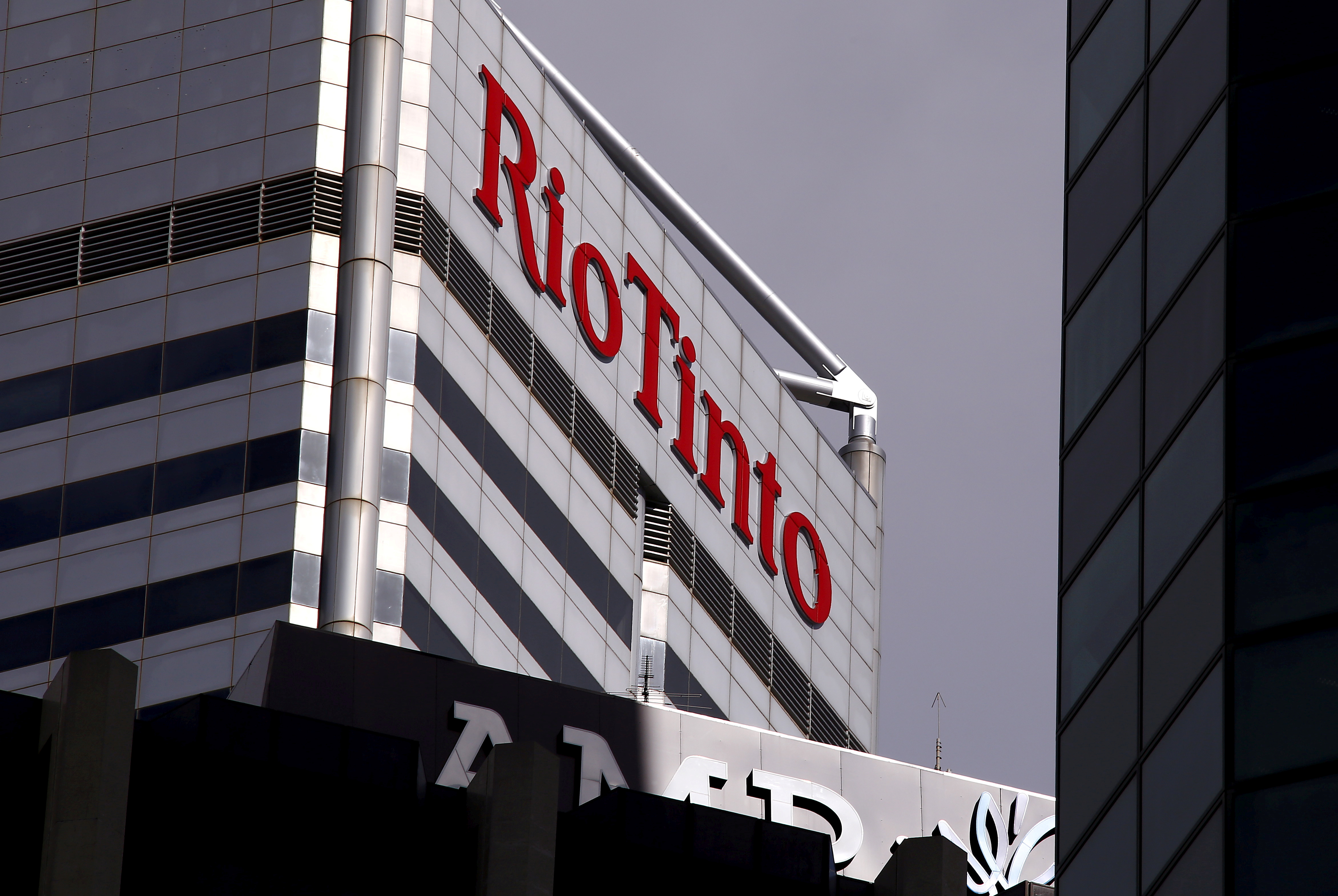 A sign adorns the building where mining company Rio Tinto has their office in Perth, Western Australia, November 19, 2015. REUTERS/David Gray