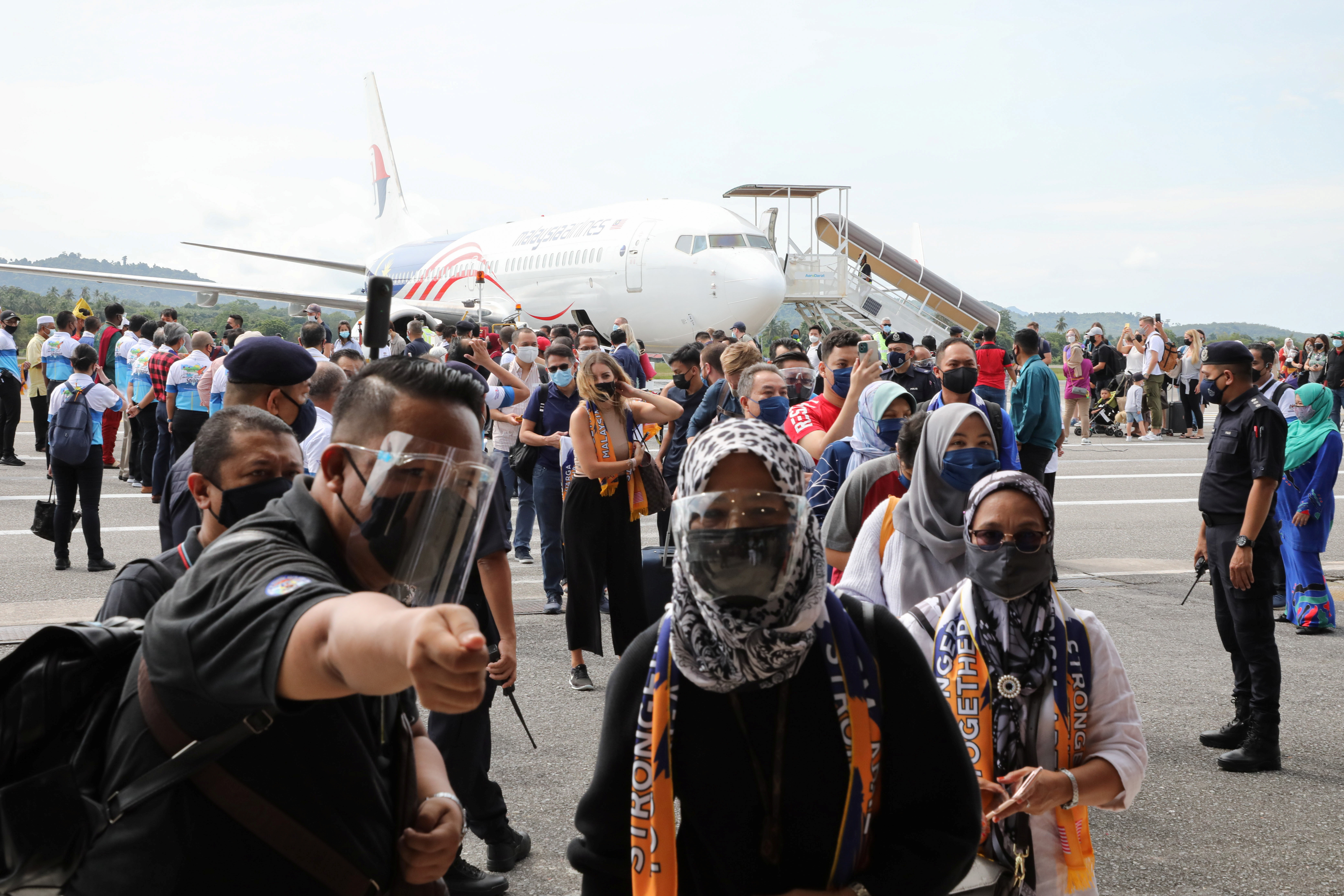 Tourists arrive at the airport as Langkawi reopens to domestic tourists, amid the coronavirus disease (COVID-19) pandemic
