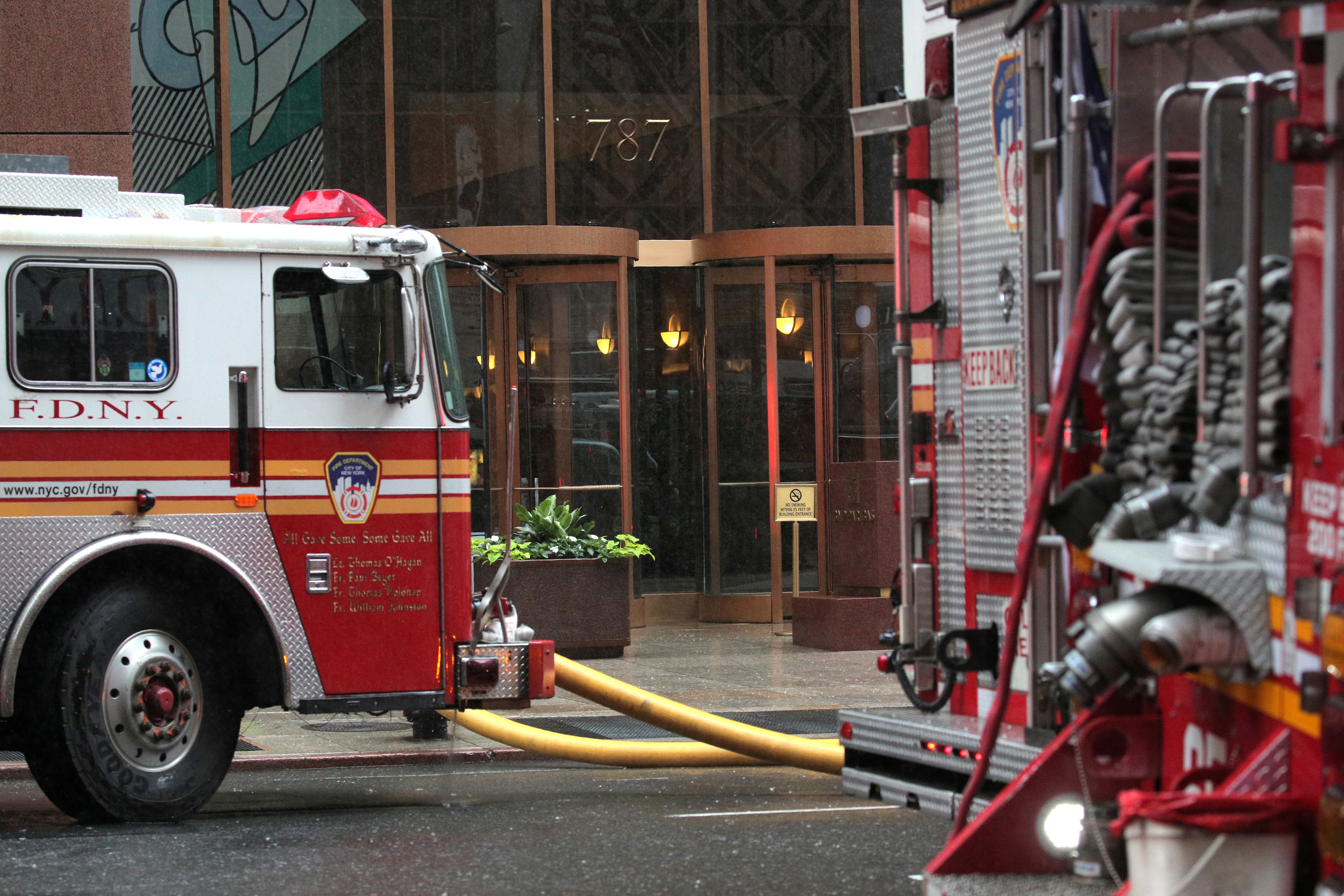 New York City Fire Department trucks are seen outside 787 7th Avenue in midtown Manhattan in New York City, New York, U.S., June 10, 2019. REUTERS/Brendan McDermid/File Photo