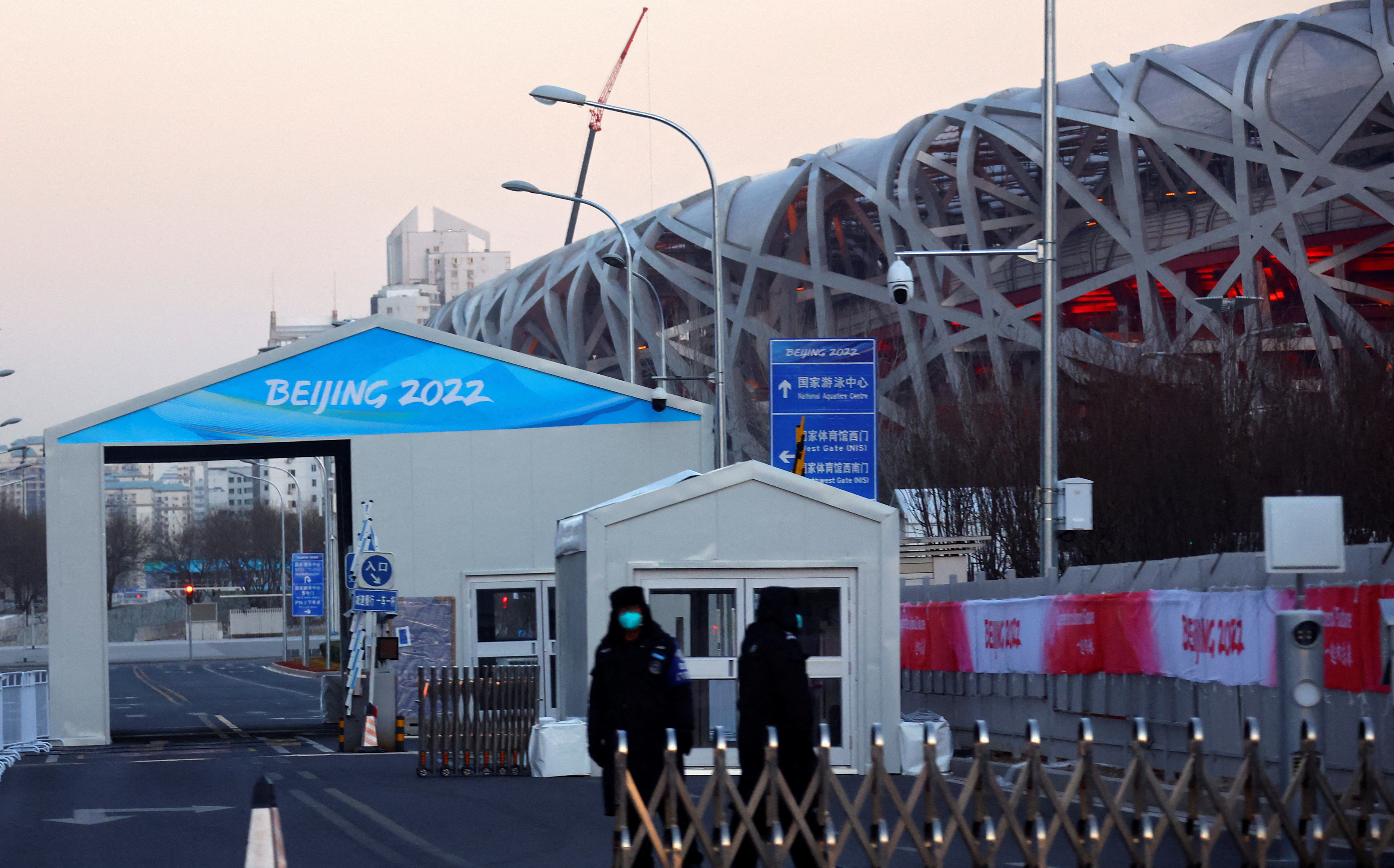 A car checkpoint is pictured in front of the National Stadium, also known as the Bird's Nest, where the opening and closing ceremonies of Beijing 2022 Winter Olympics will be held in Beijing, China January 11, 2022.    REUTERS/Fabrizio Bensch