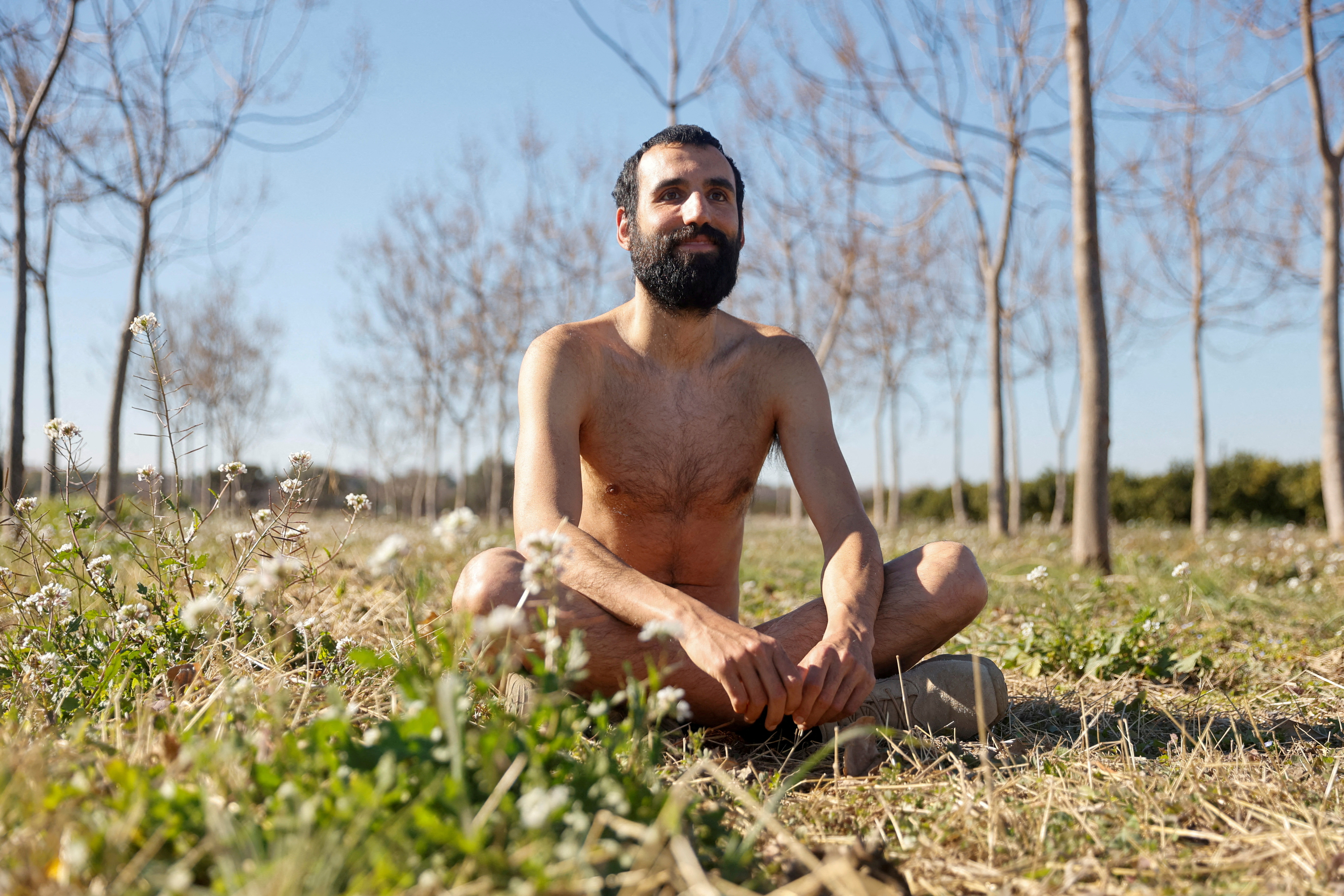 Alejandro Colomar poses naked in his vegetable garden in Aldaia
