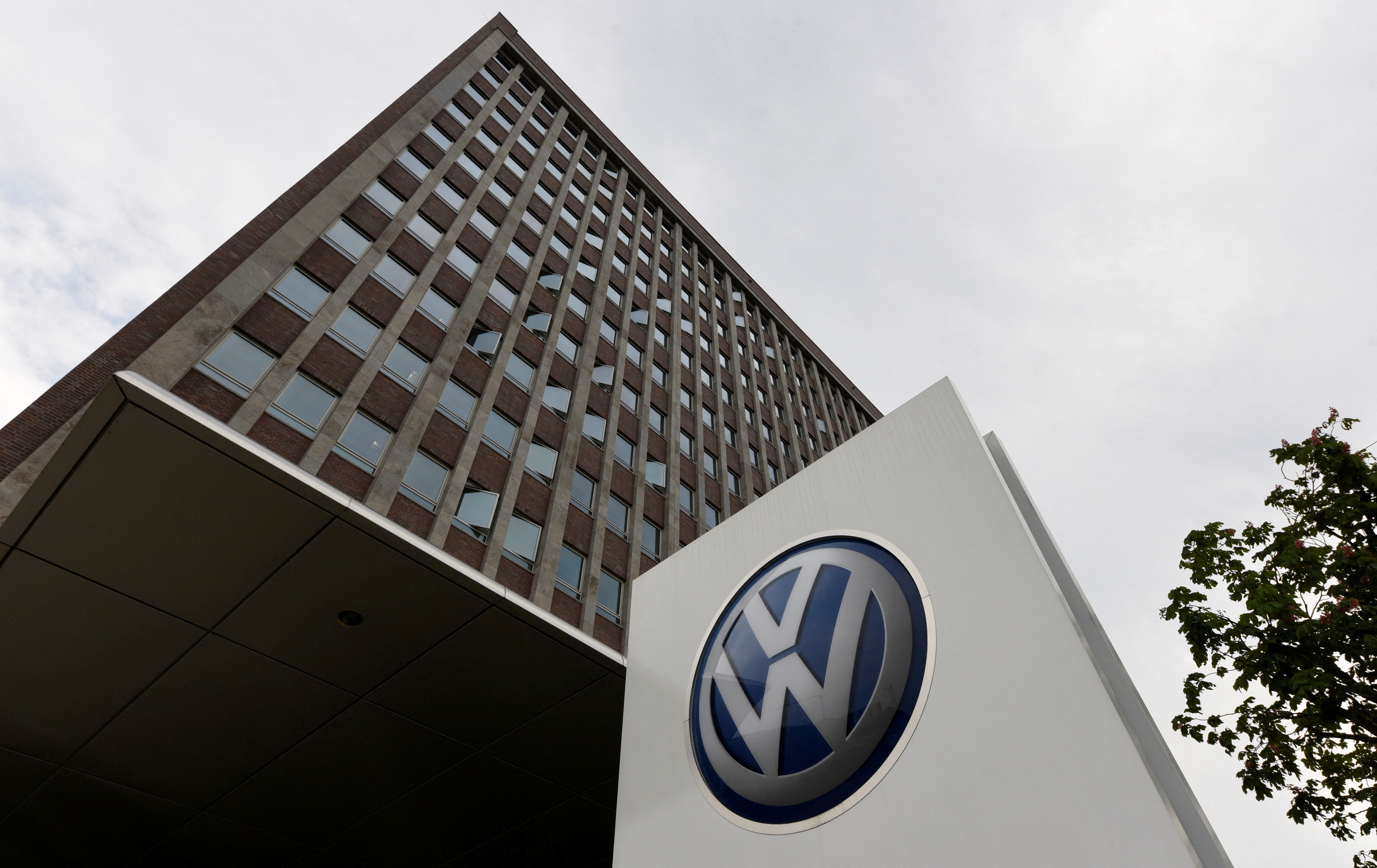 A VW logo is seen in front of the main building of the Volkswagen brand at the Volkswagen headquarters during a media tour to present Volkswagen's so called 