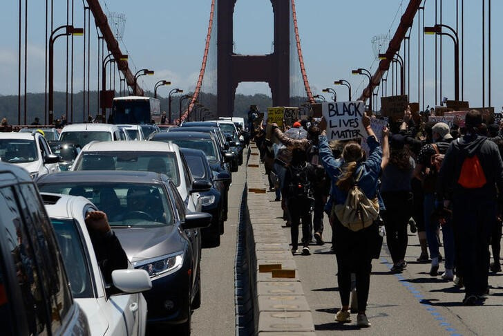 Thousands march during a protest against racial inequality in San Francisco