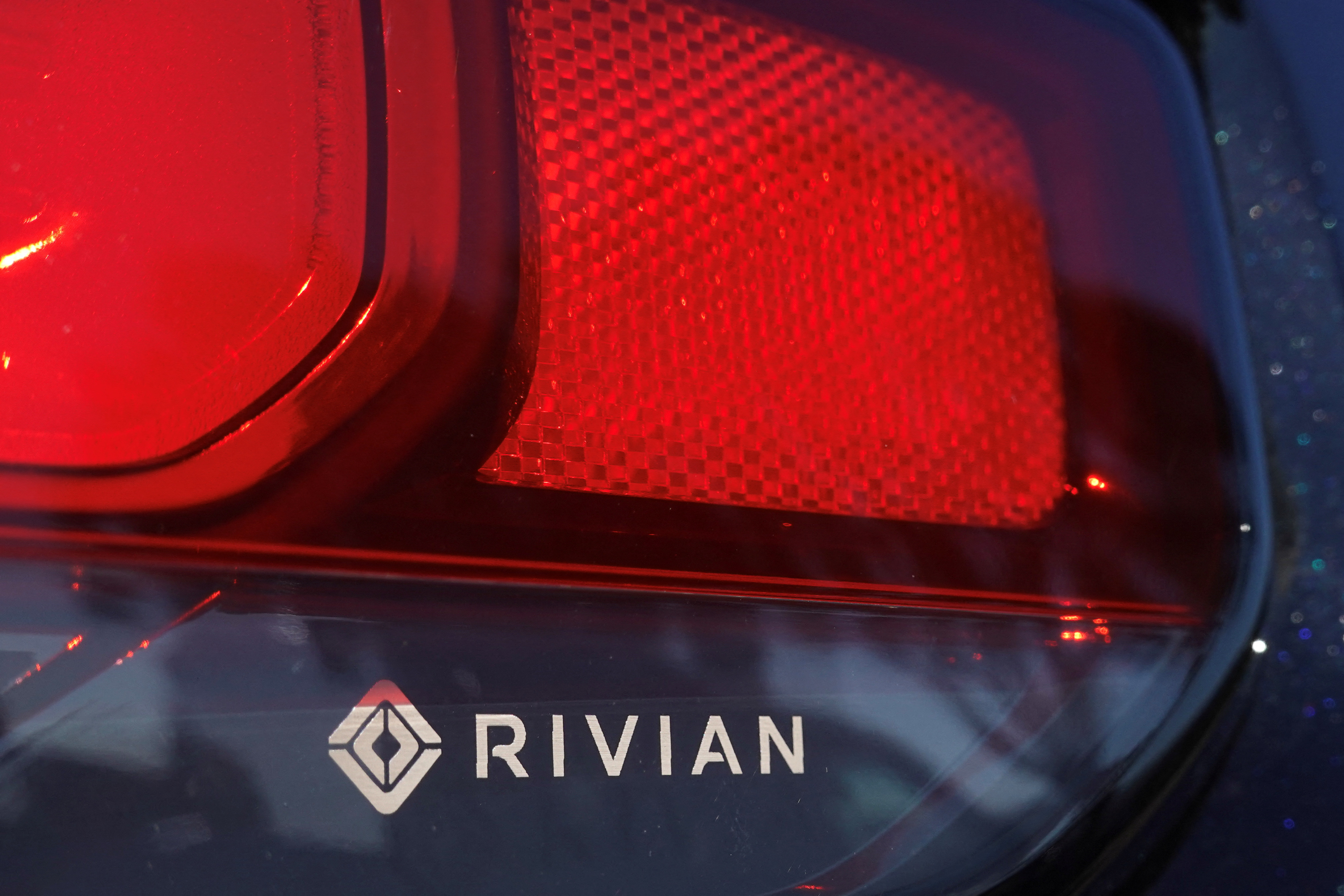 The Rivian name and logo are shown on one of their new electic SUV vehicles in California