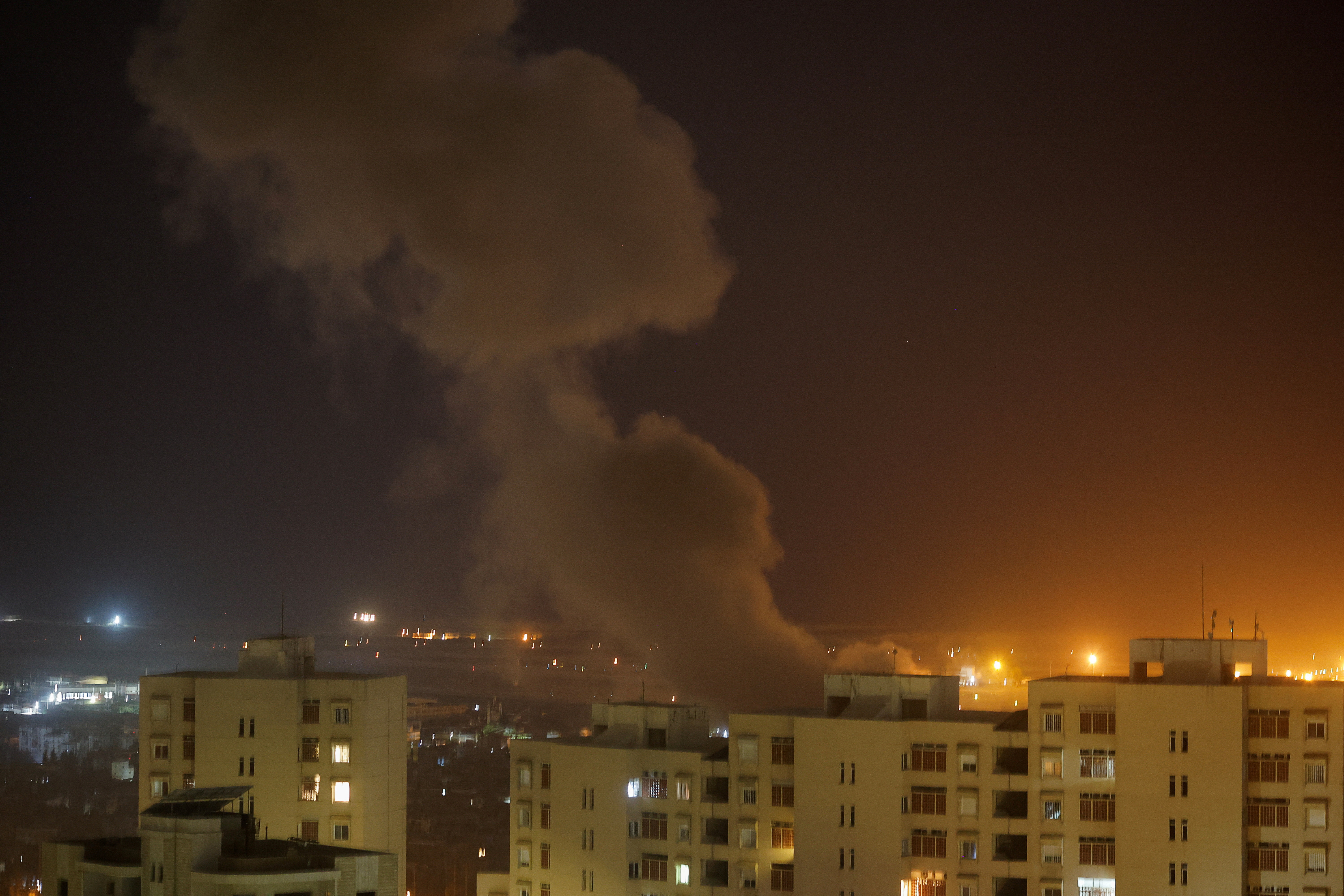 Smoke billows in Beirut's southern suburbs, after an Israeli strike