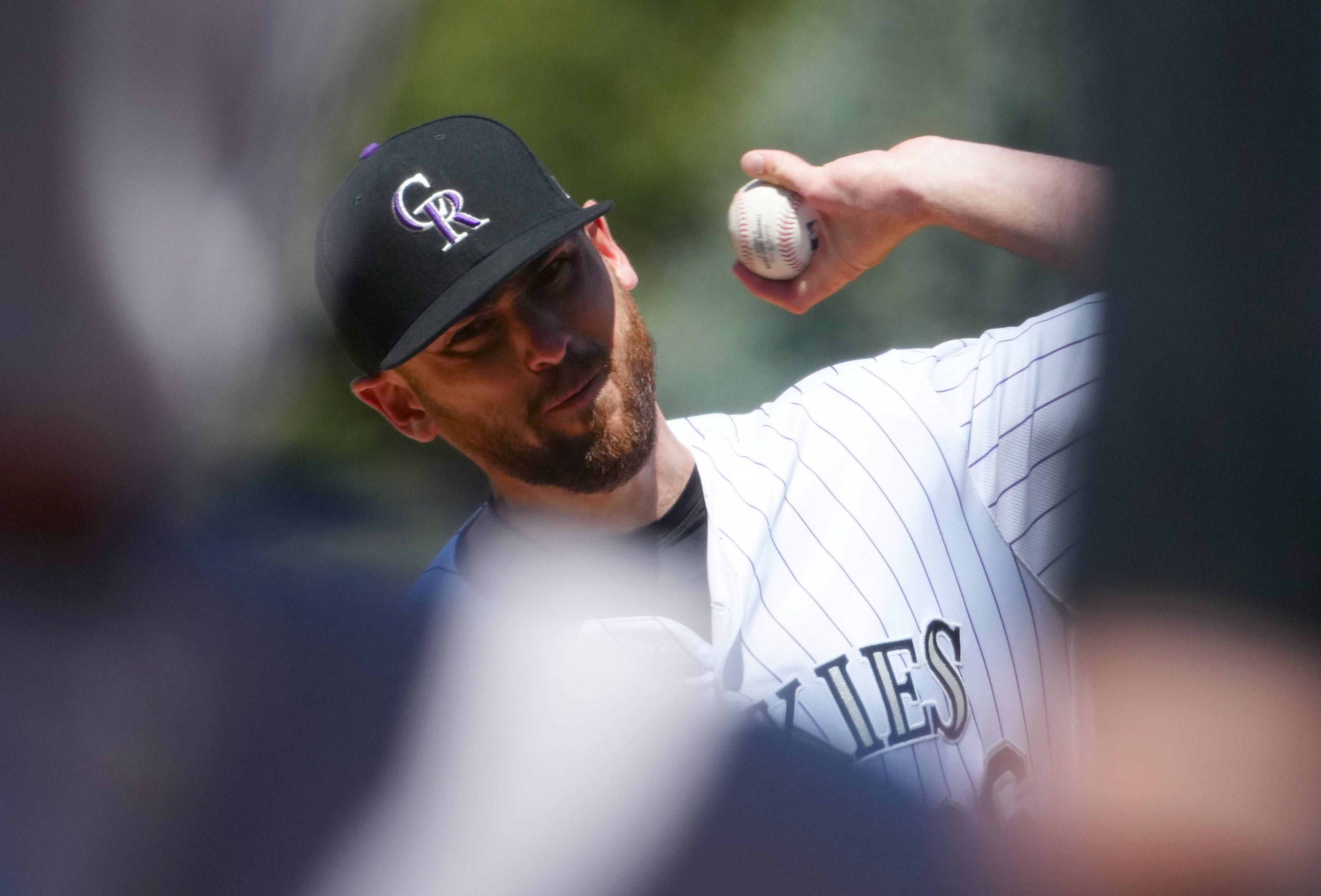 Rockies offense explodes in 12-4 win to avoid sweep