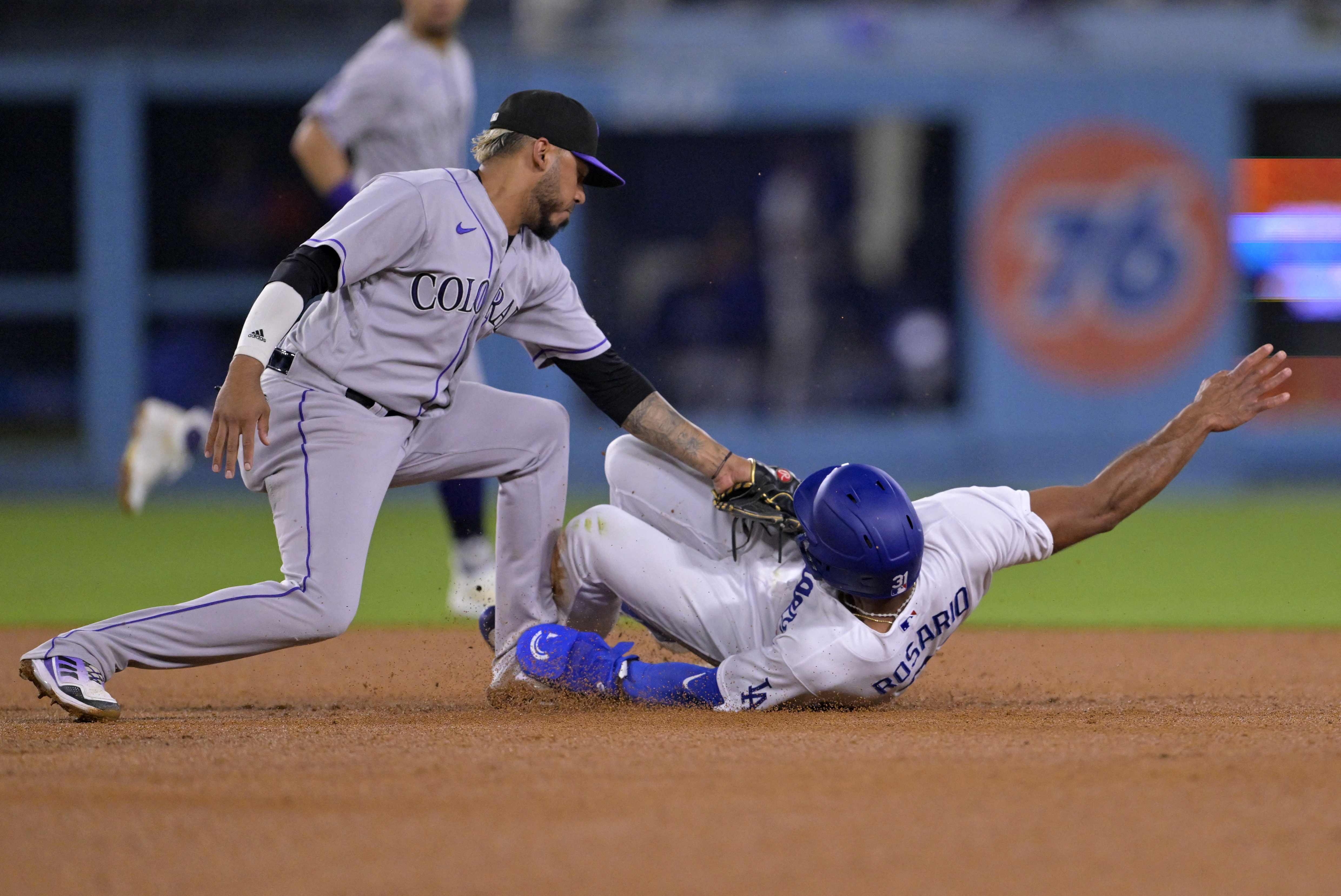 Dodgers use four-run sixth to tame Rockies, 6-1