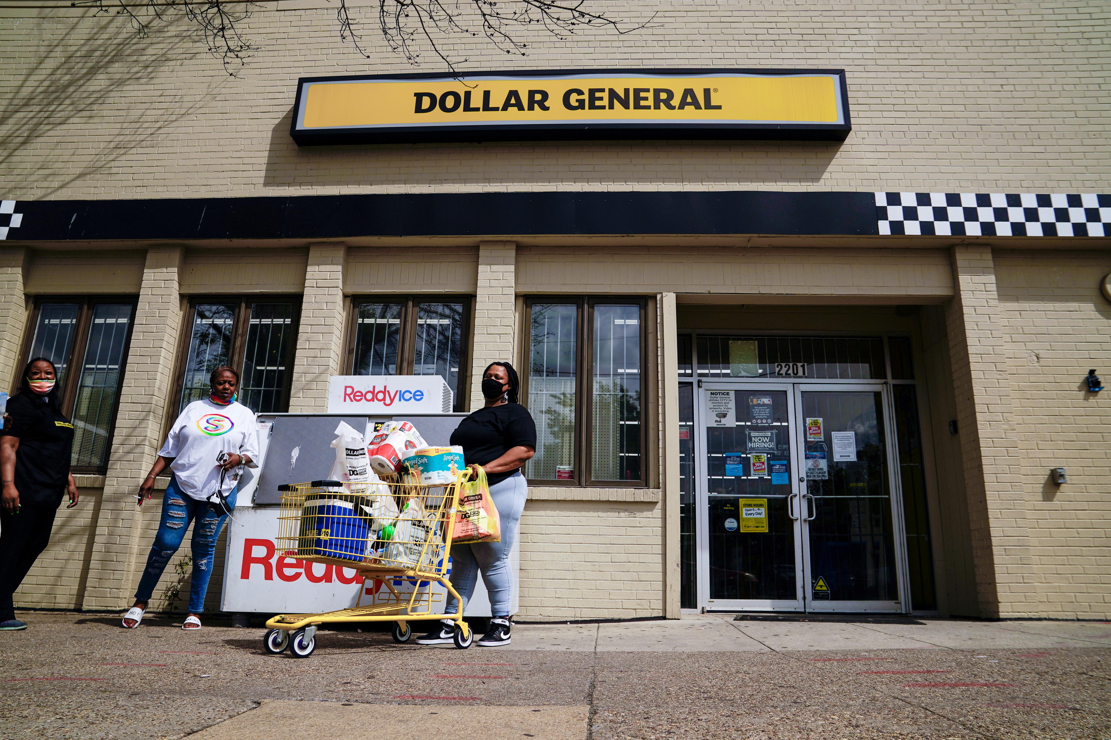 A person exits a Dollar General store in Mount Rainier, Maryland, U.S., June 1, 2021. REUTERS/Erin Scott/File Photo