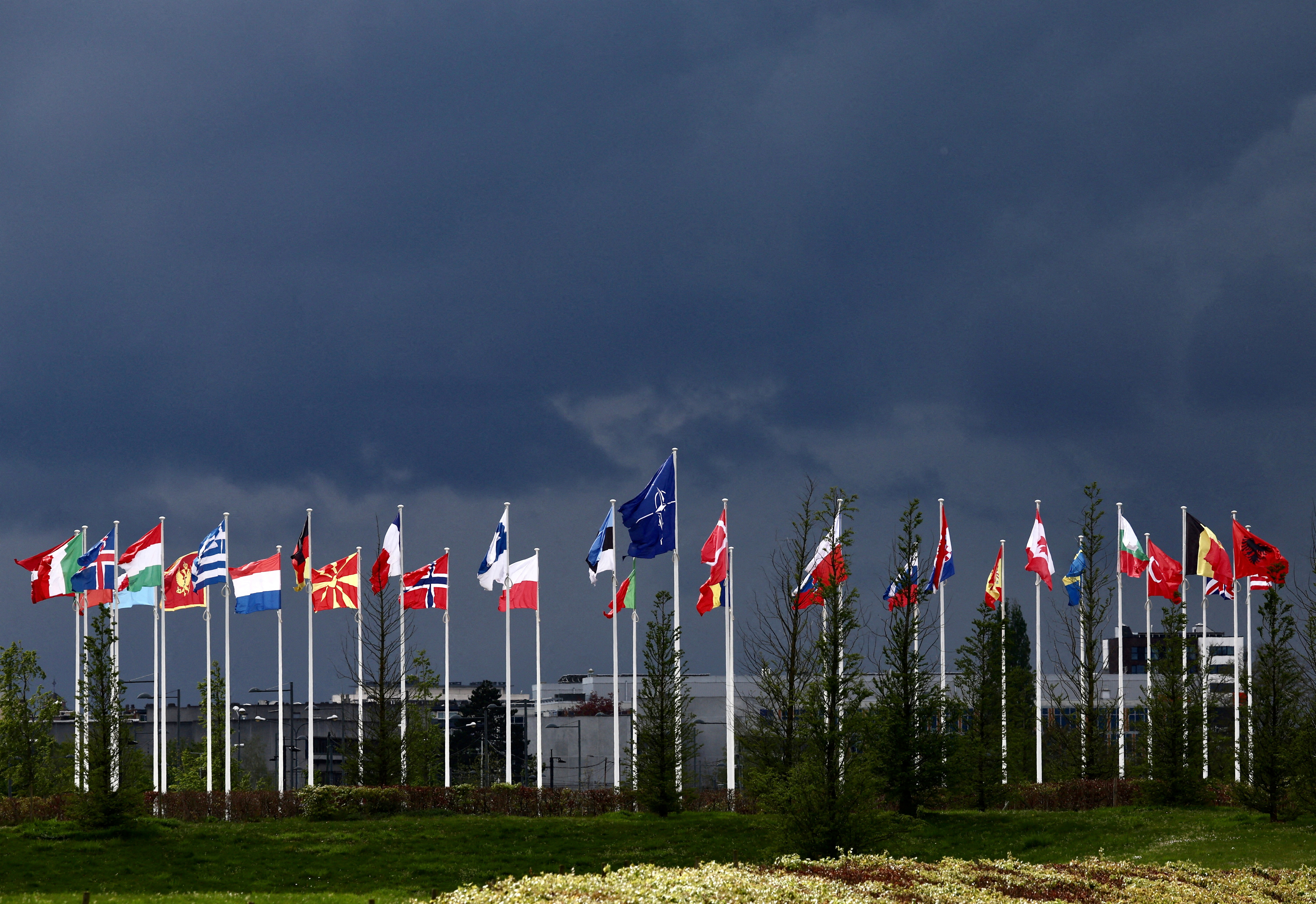 National flags of the Alliance's members flutter at the NATO headquarters in Brussels