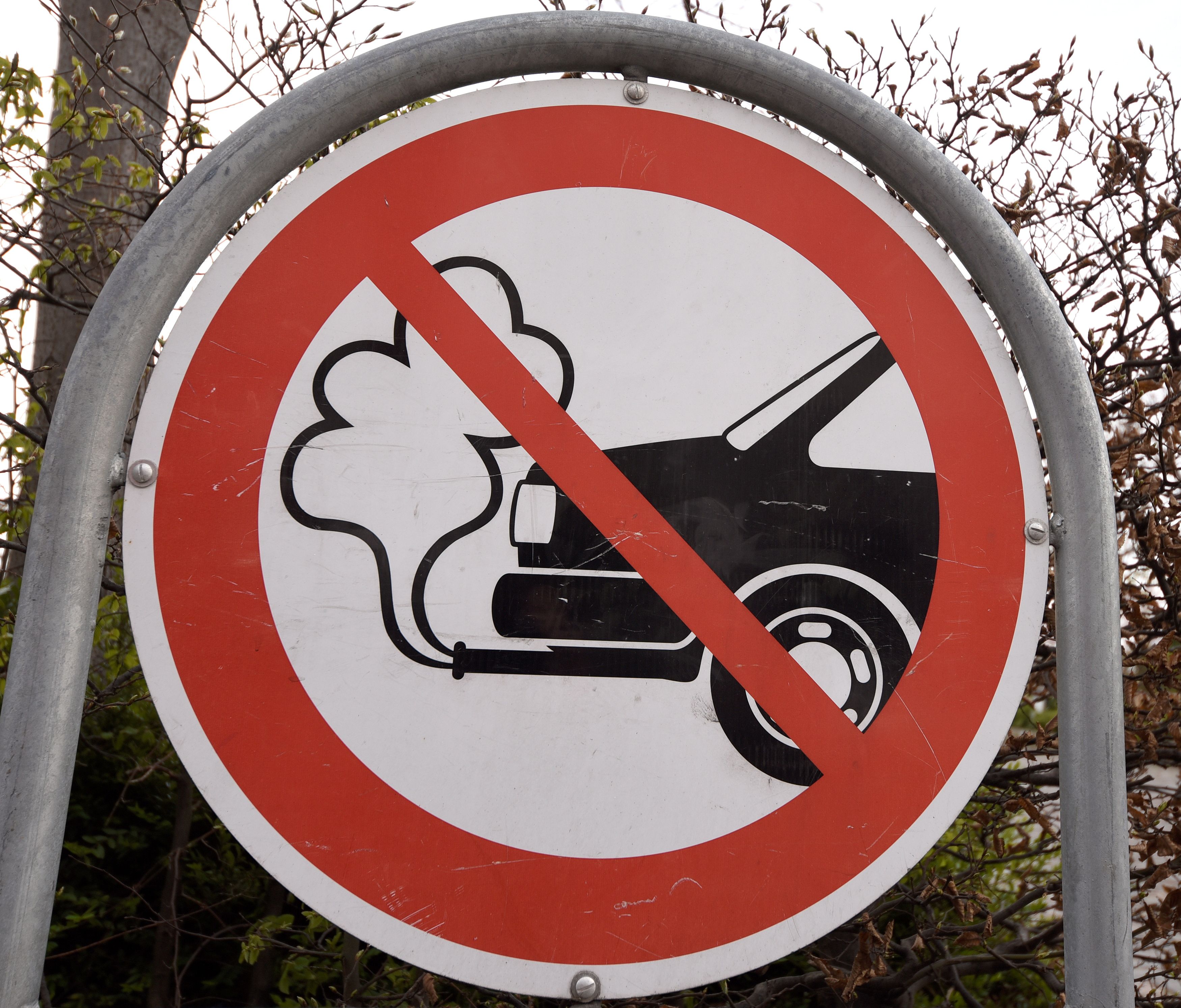 An anti-exhaust emission traffic sign is pictured in Copenhagen, Denmark April 18, 2017.  REUTERS/Fabian Bimmer