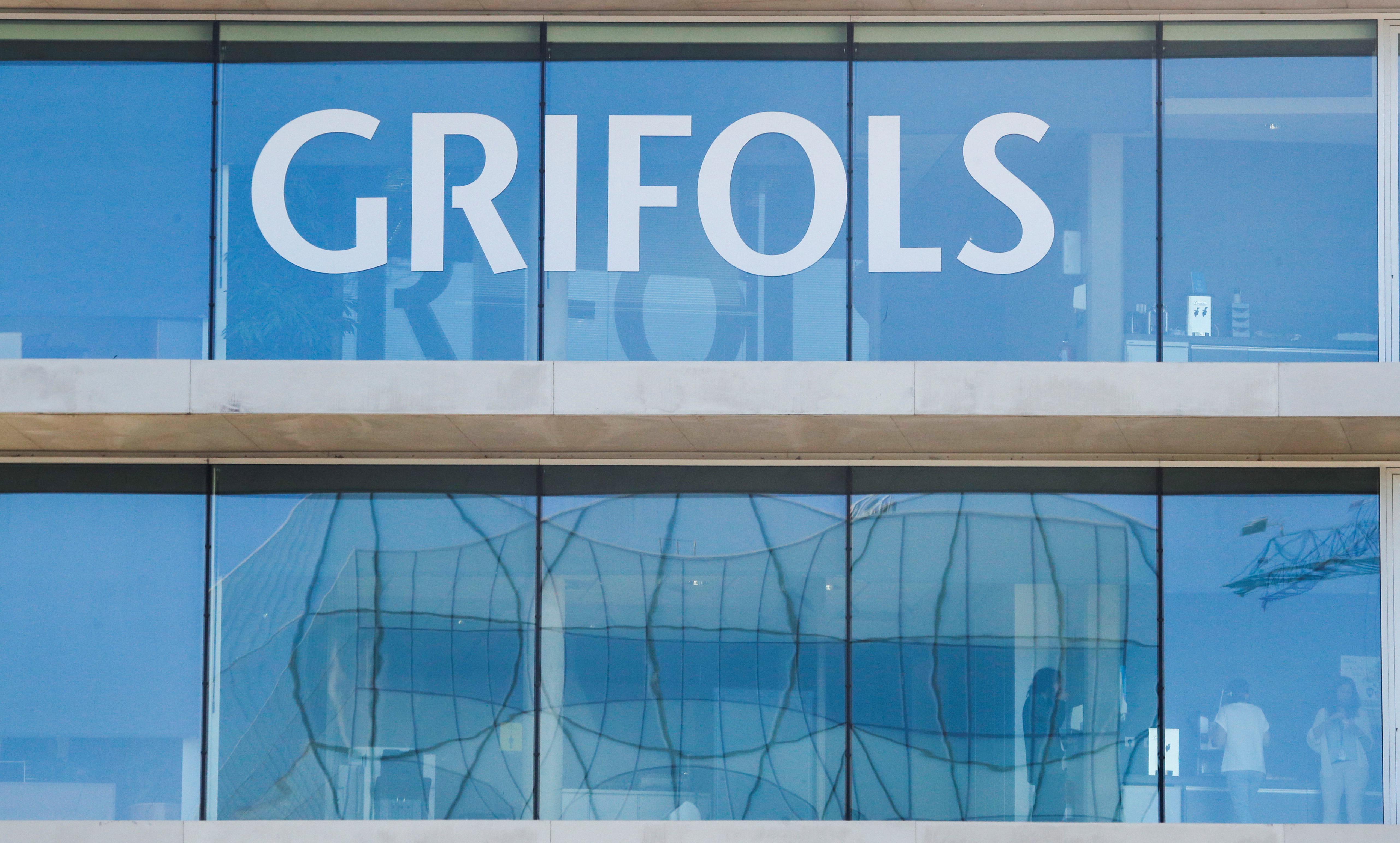 The logo of the Spanish pharmaceuticals company Grifols is pictured on their headquarters' building in Sant Cugat del Valles