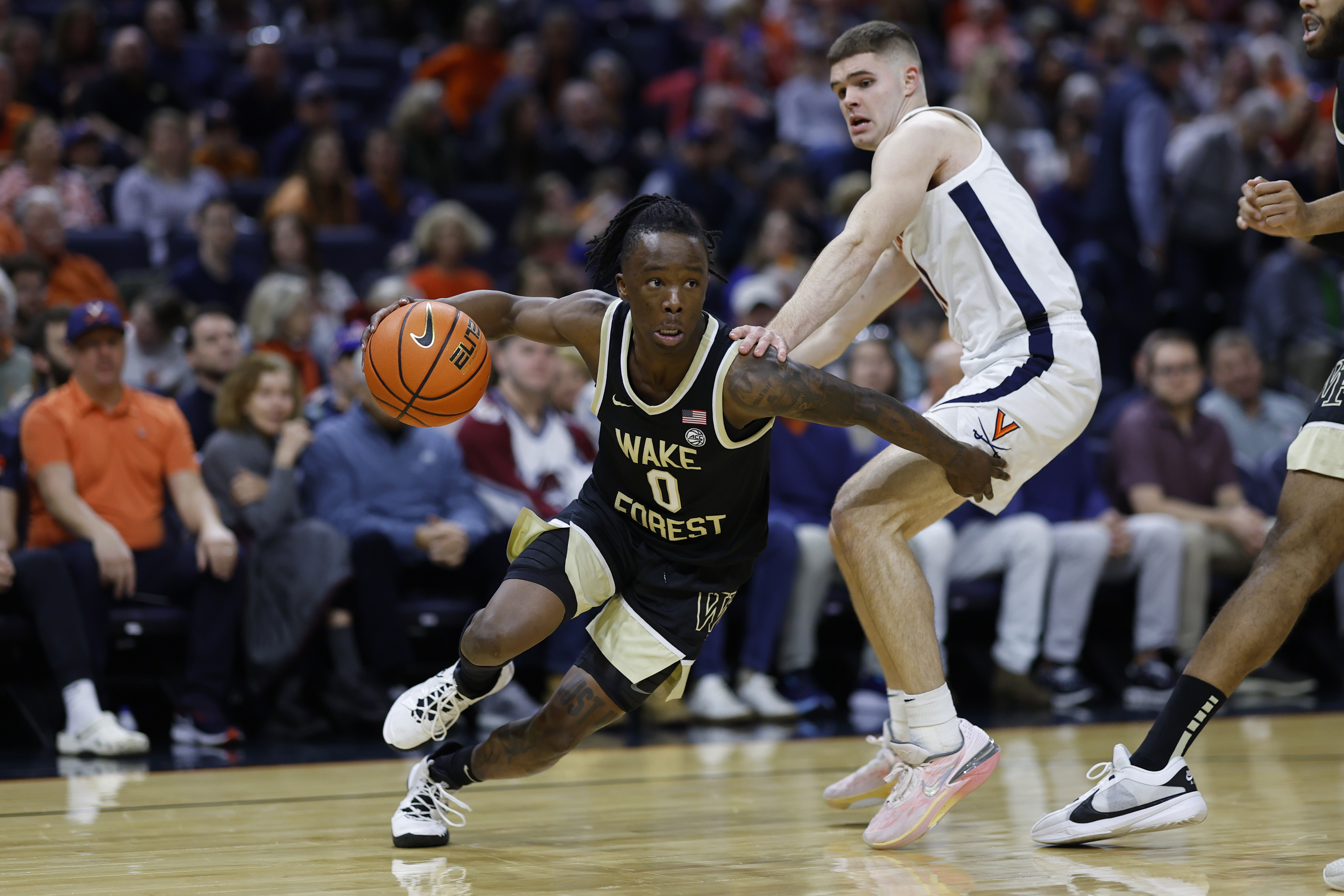 Reece Beekman helps No. 21 Virginia edge Wake Forest | Reuters