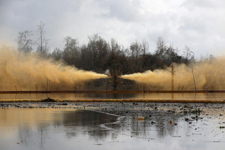 A view of an oil spill from a well head is pictured at Santa Barbara, in Nembe, Bayelsa