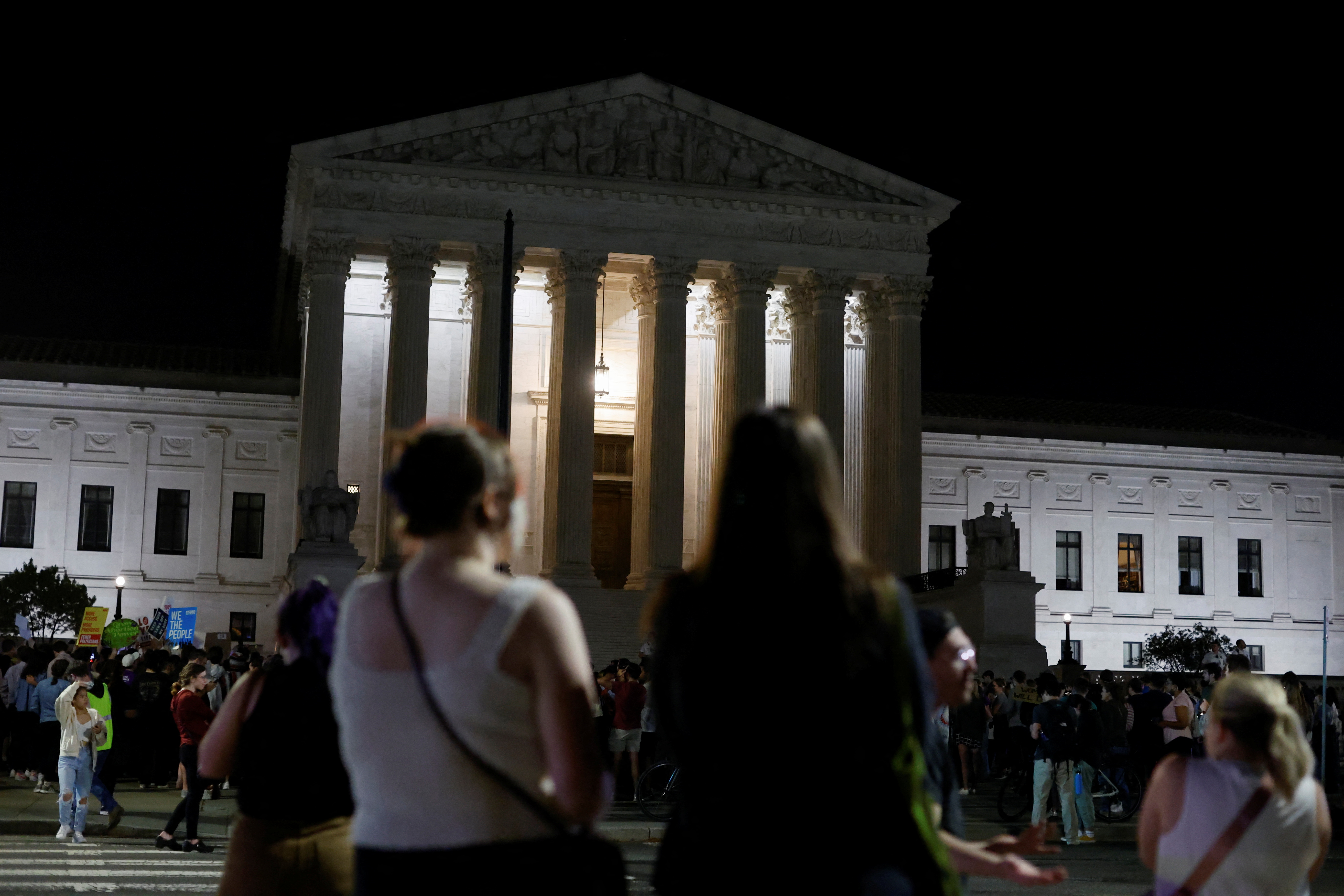 Protestors react outside the U.S. Supreme Court after the leak of a draft opinion preparing for a majority of the court to overturn the Roe v. Wade abortion rights decision in Washington