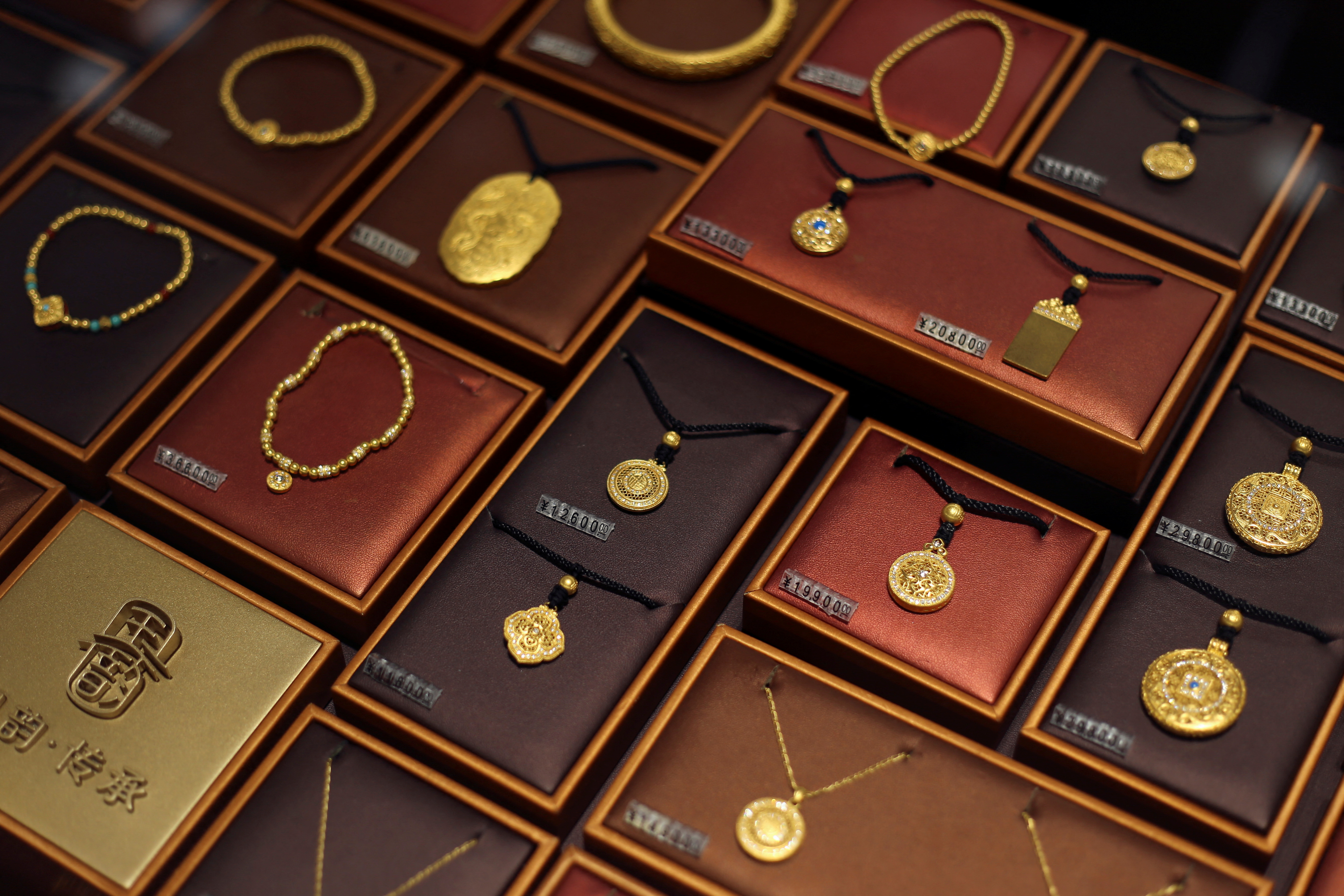 Gold jewellery displayed for sale at Chow Tai Fook jewellery store in Shanghai