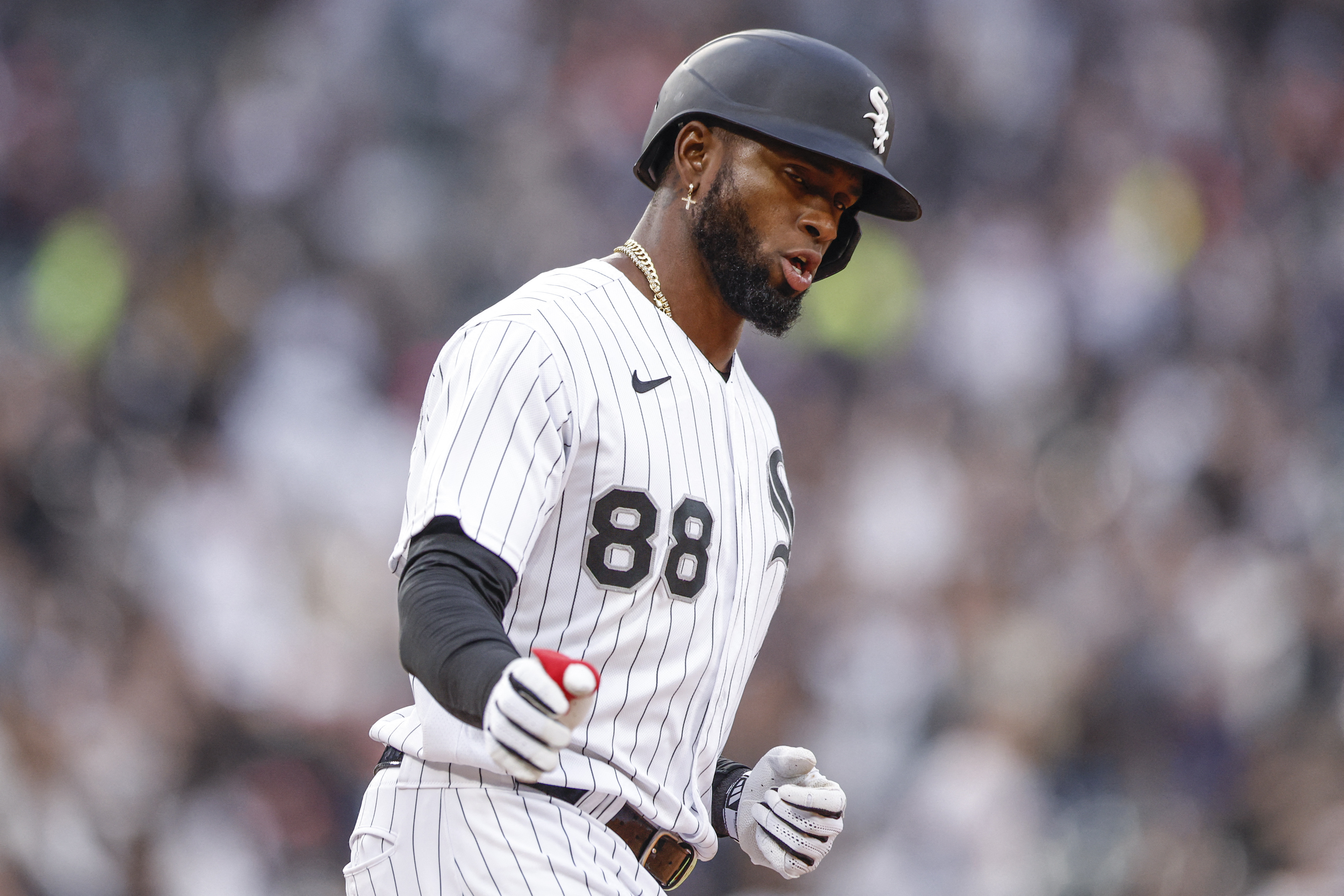 CHICAGO, IL - JUNE 09: Chicago White Sox center fielder Luis Robert Jr.  (88) looks on after hitting a game winning single during a Major League  Baseball game between the Miami Marlins