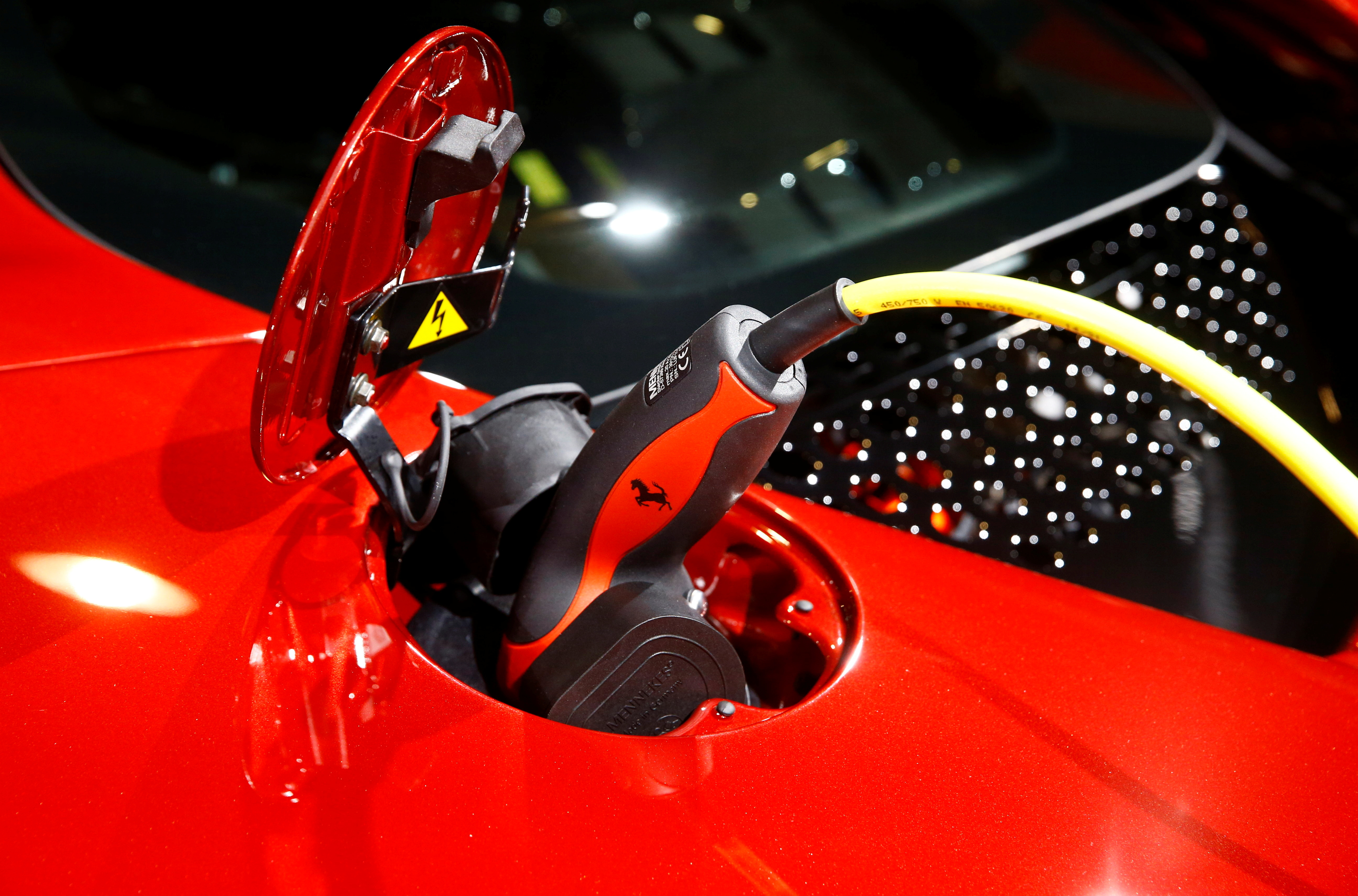A Ferrari SF90 Stradale hybrid sports car is seen during at the Auto Zurich Car Show in Zurich