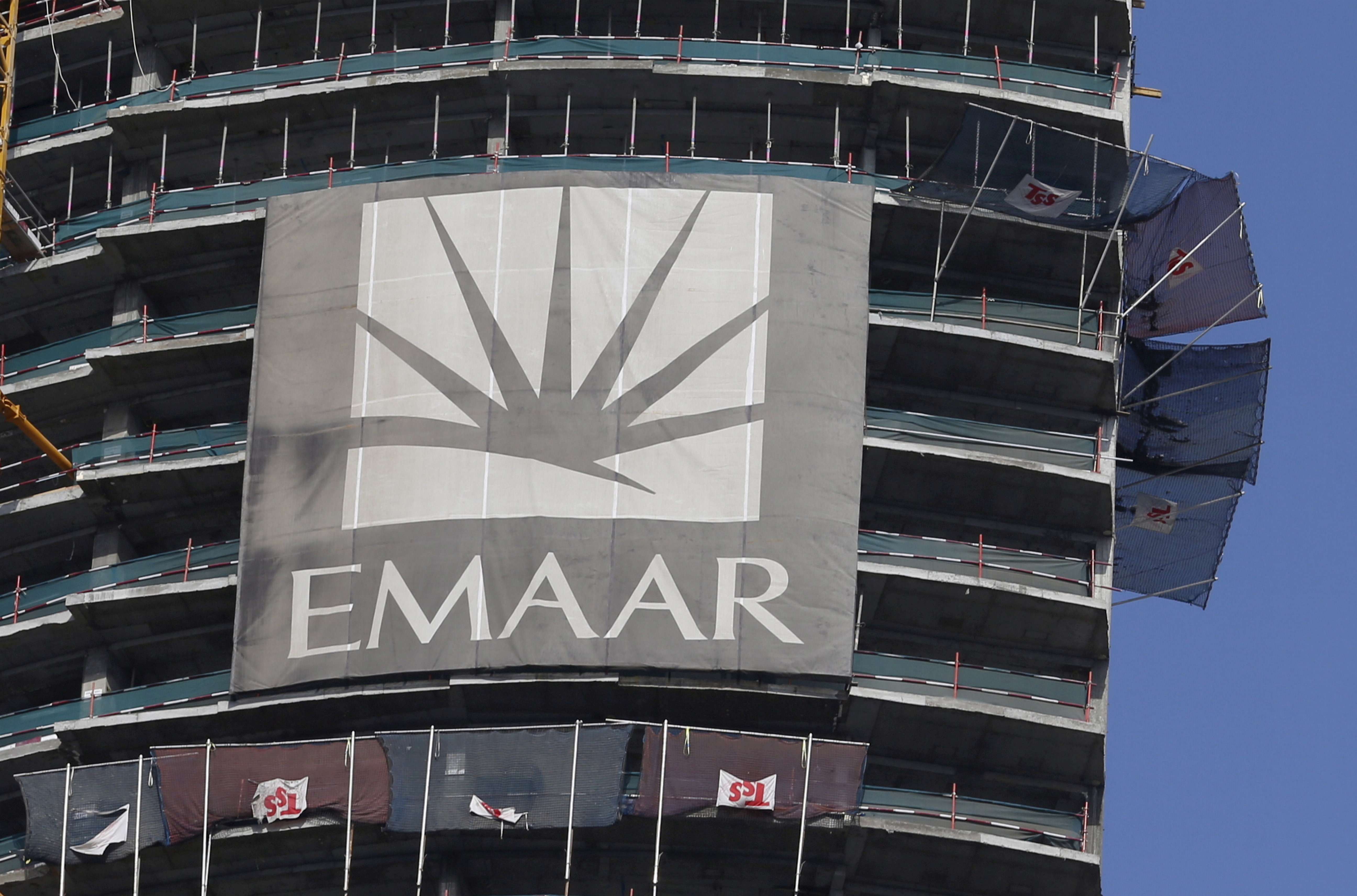 The logo of Dubai's Emaar Properties on a building under construction in Dubai