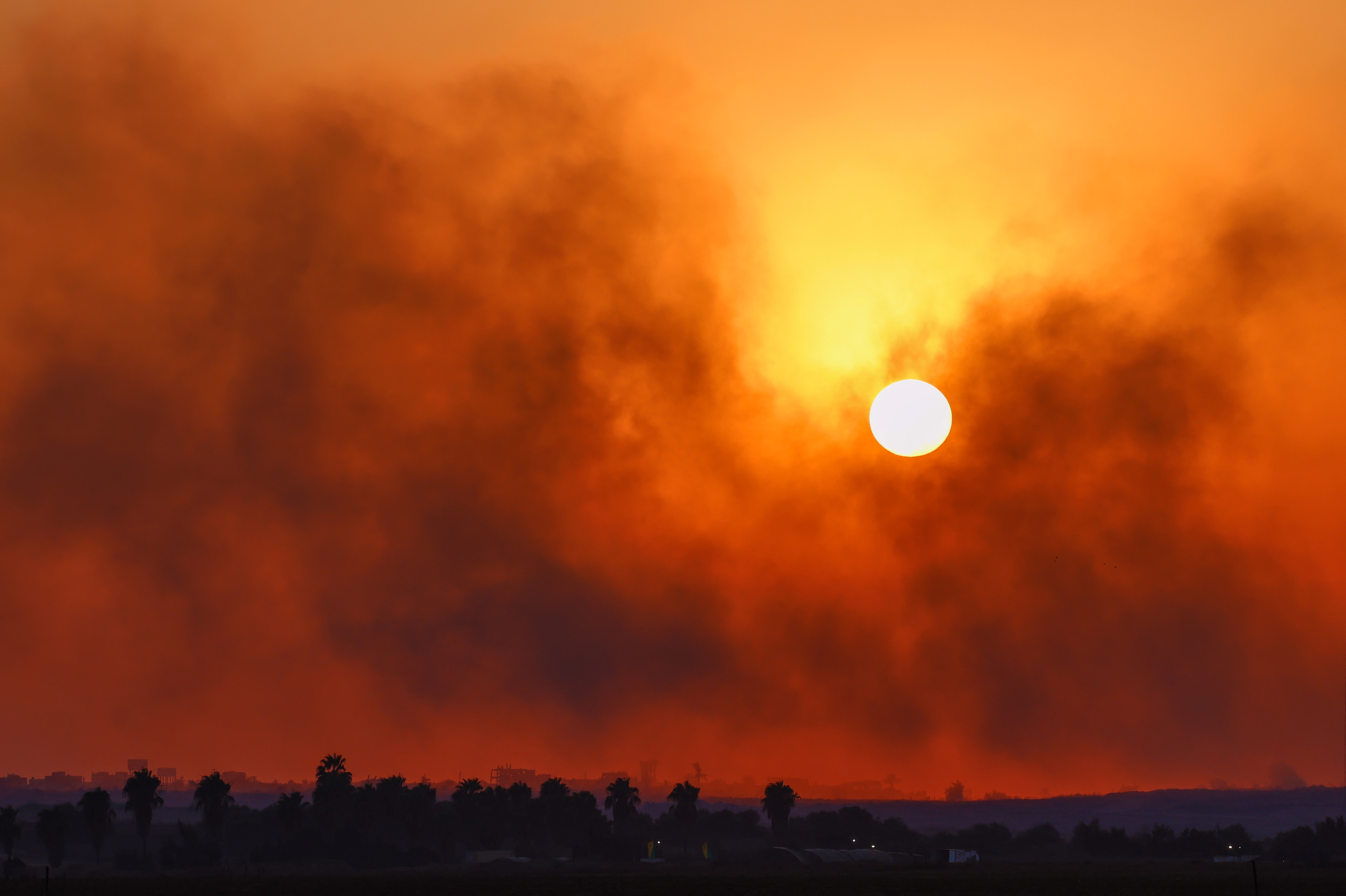 Smoke rises from Gaza after an explosion, as seen from the Israel border