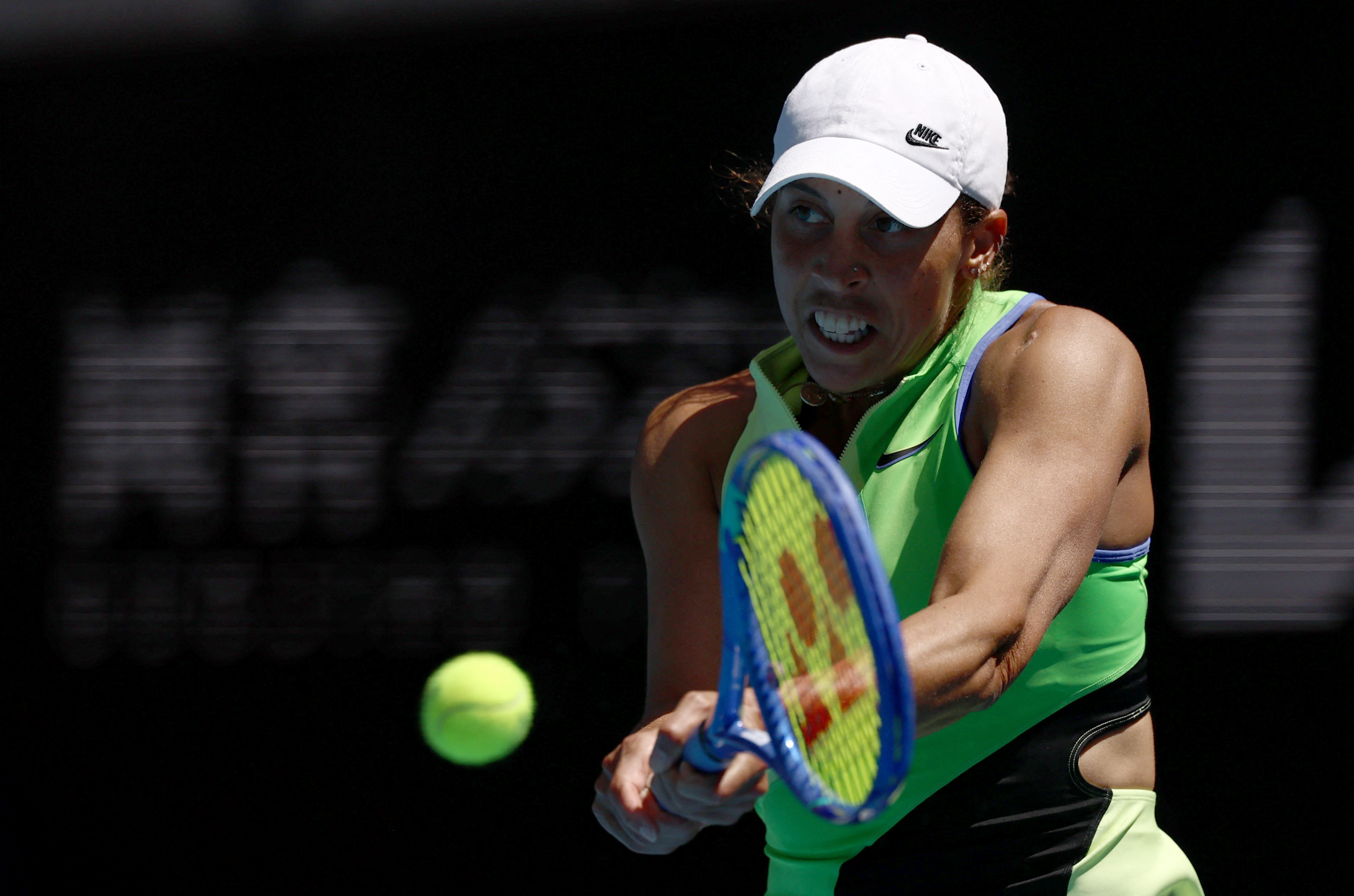 Defending champion Keys survives mid-set wobble to advance | Reuters