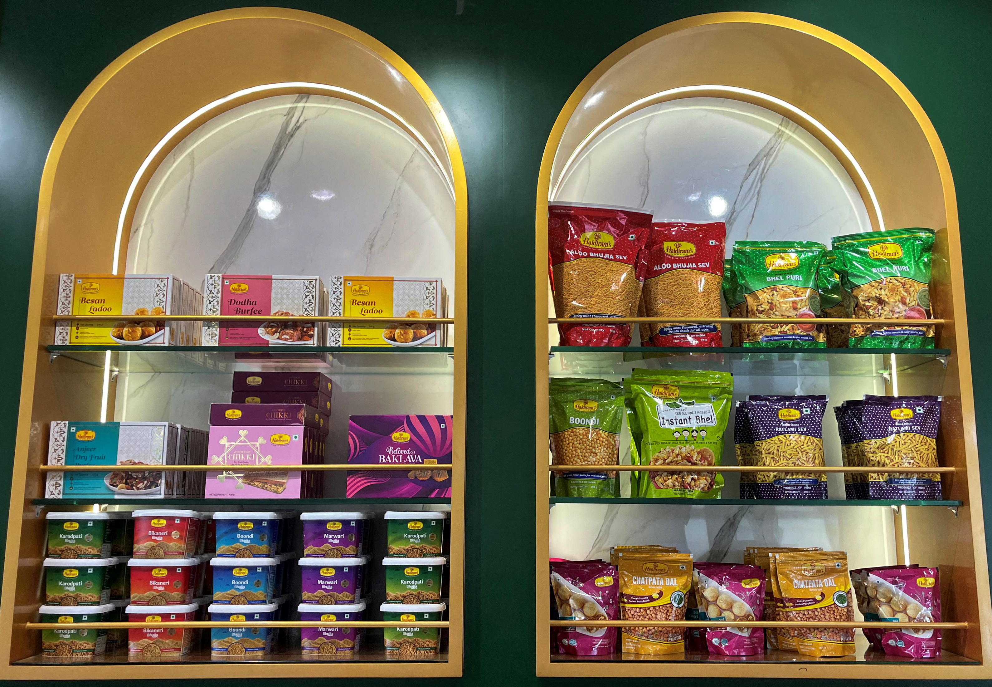 A view shows packets of snacks on shelves inside a Haldiram's restaurant in Mumbai