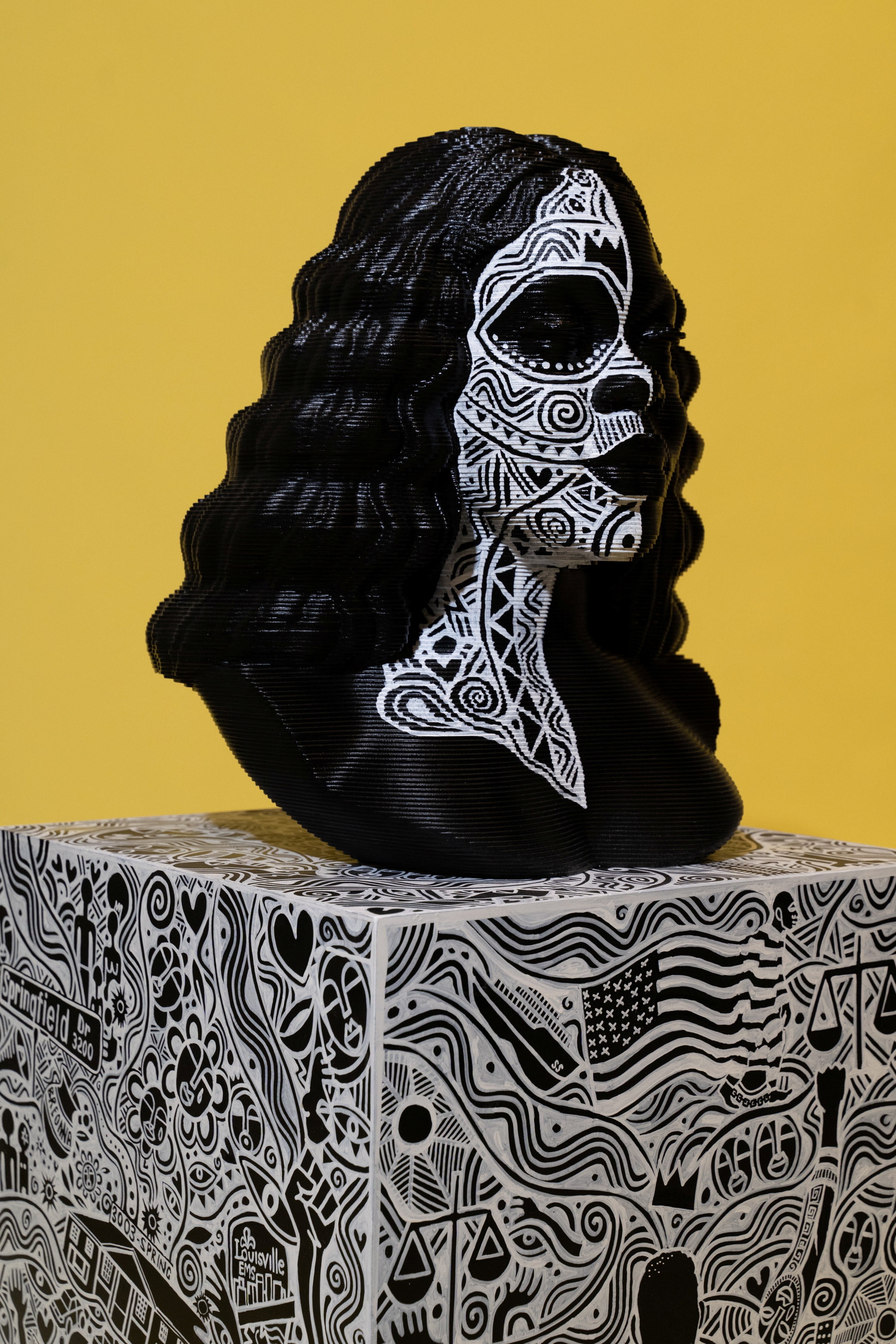 A sculpture by Chris Carnabuci and Laolu of Breonna Taylor, the Black woman shot and killed during a police raid on her Kentucky, U.S., apartment in March 2020, is seen in an undated photo ahead of an auction at Sotheby's in New York, U.S.  Chris Carnabucci, Laolu NYC and Sotheby's/Handout via REUTERS