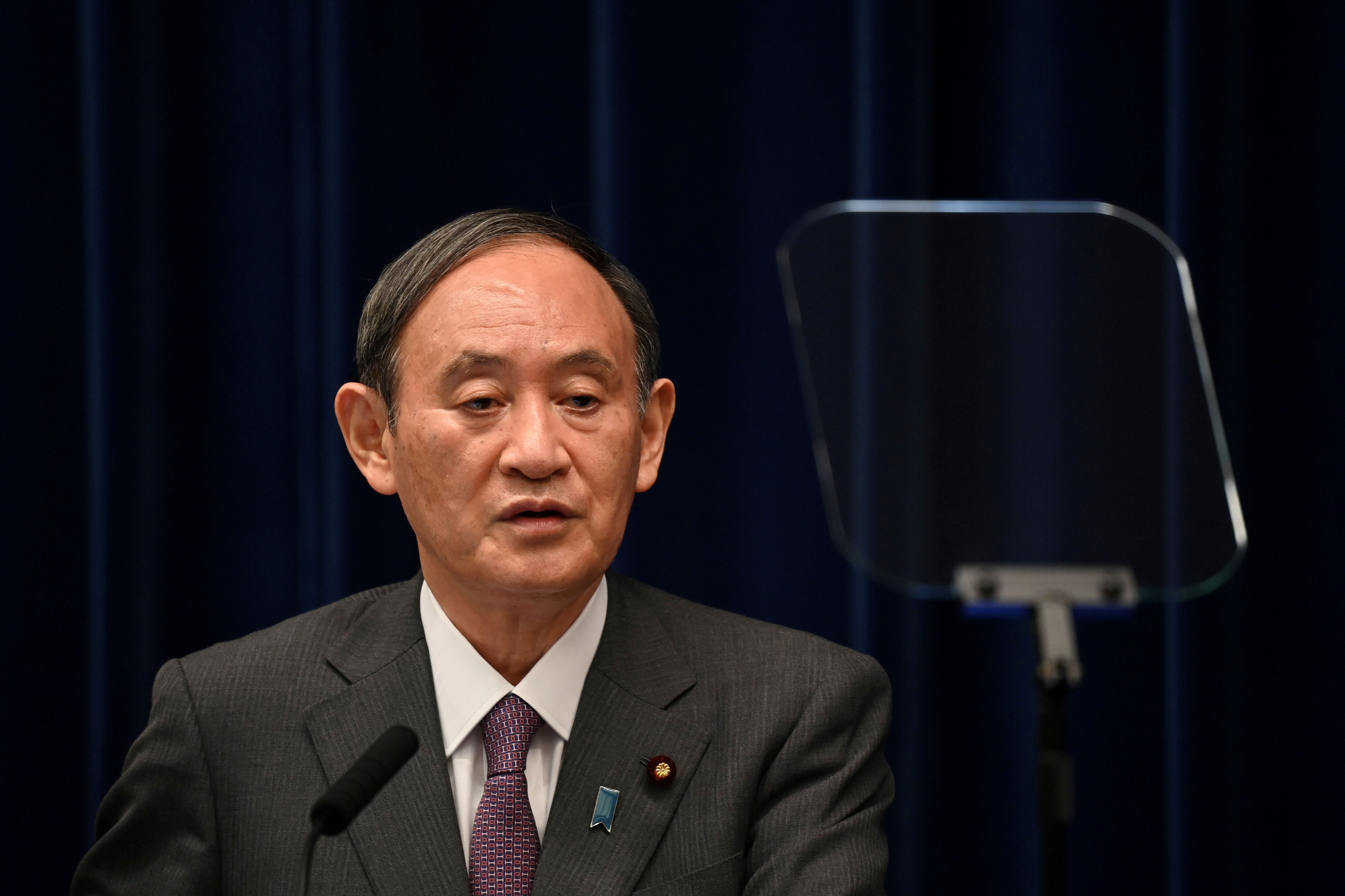Japan's Prime Minister Yoshihide Suga holds a news conference, in Tokyo