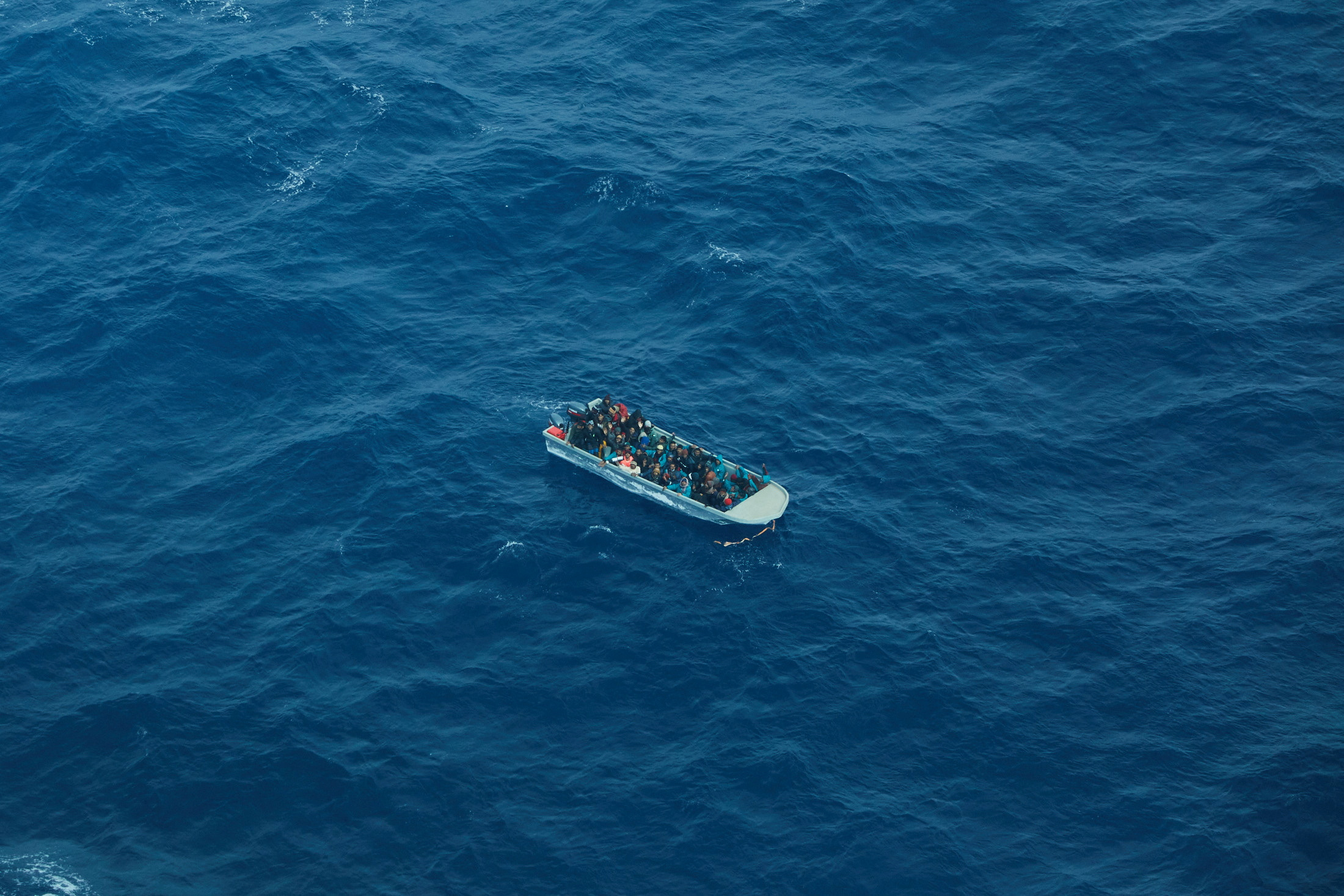 Survivors Of Libya Shipwreck Brought Ashore In Italy | Reuters