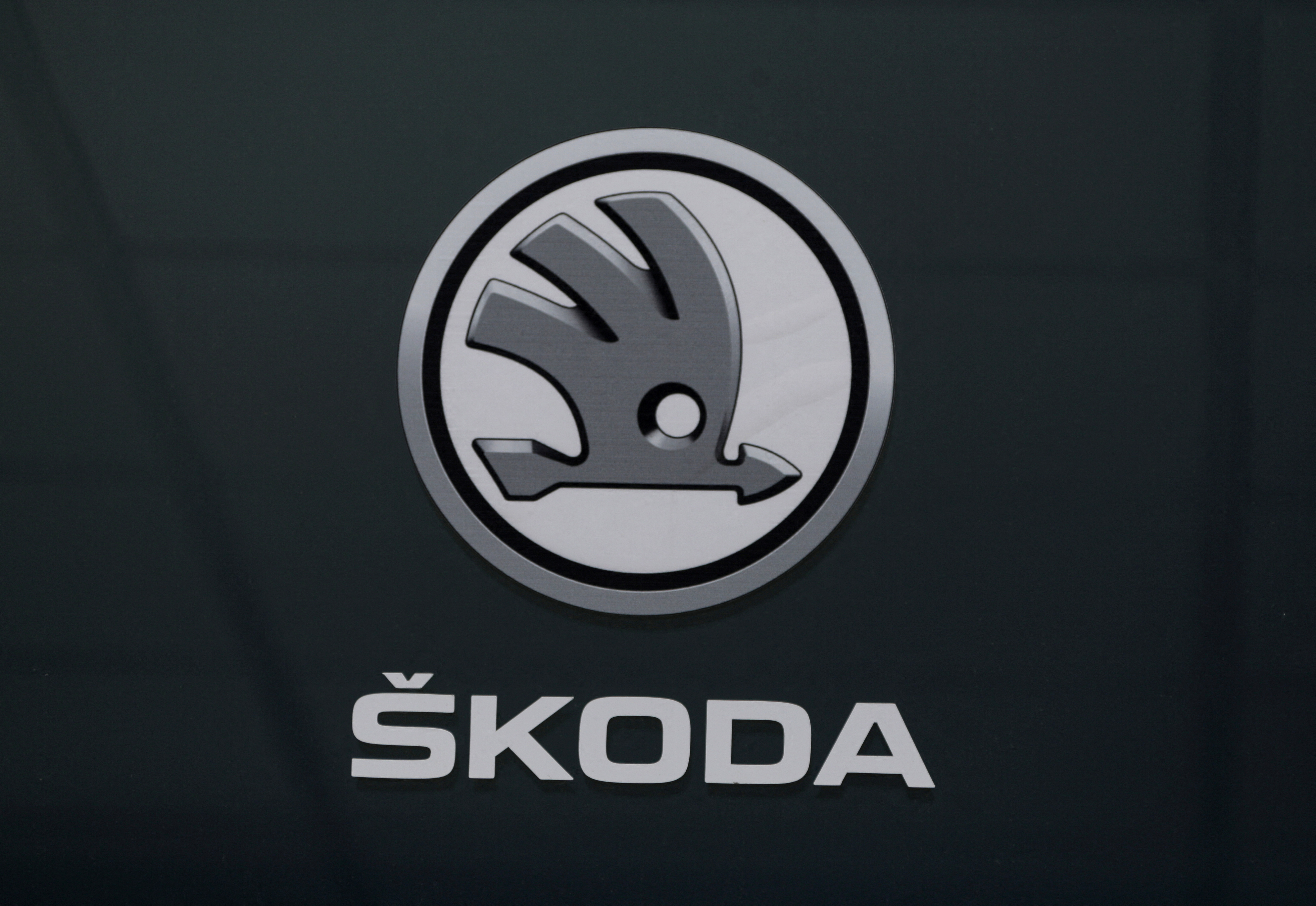 The logo of Skoda carmaker is seen at the entrance of a showroom in Nice