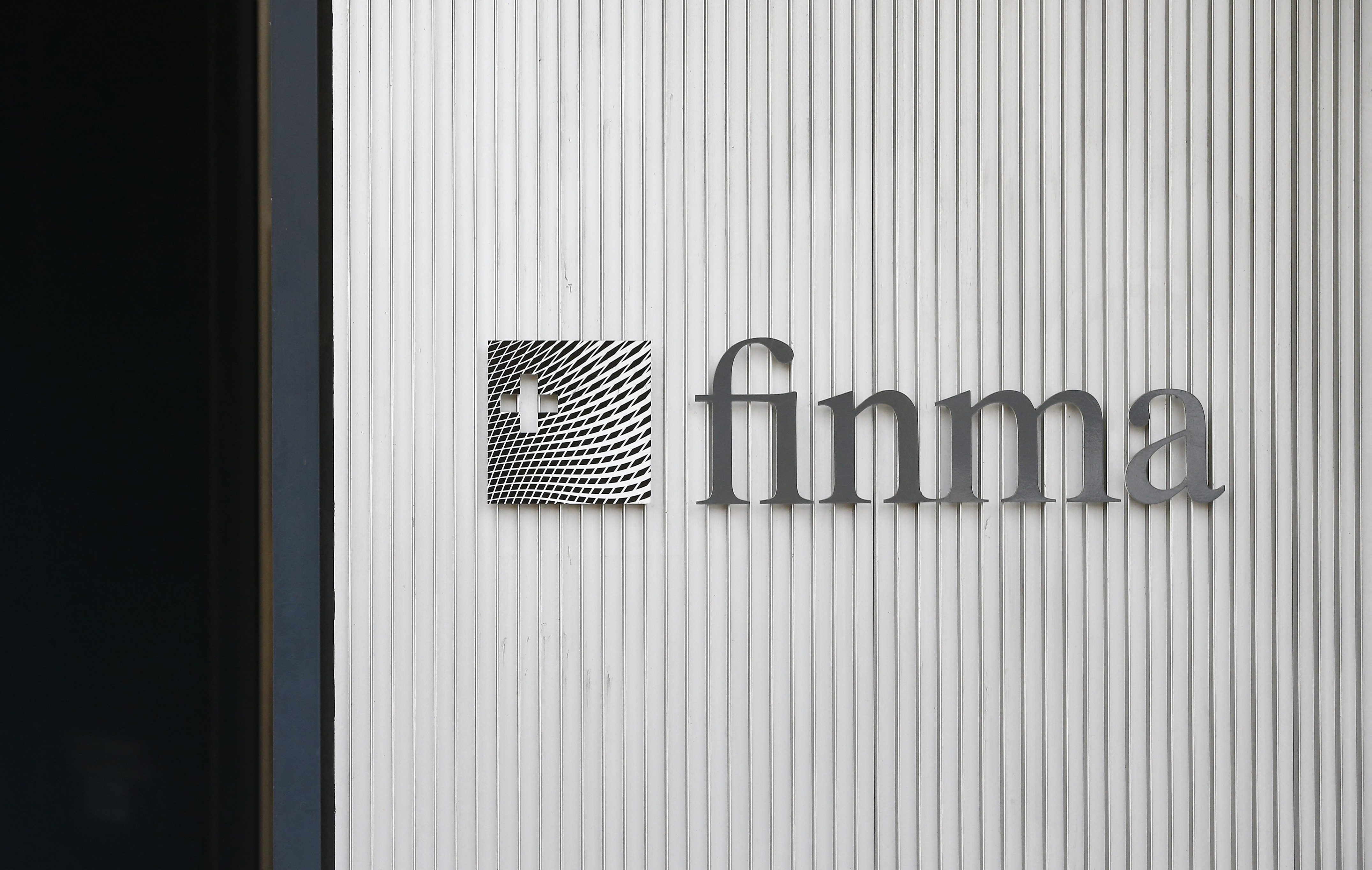 The logo of Swiss Financial Market Supervisory Authority FINMA is seen outside their headquarters in Bern