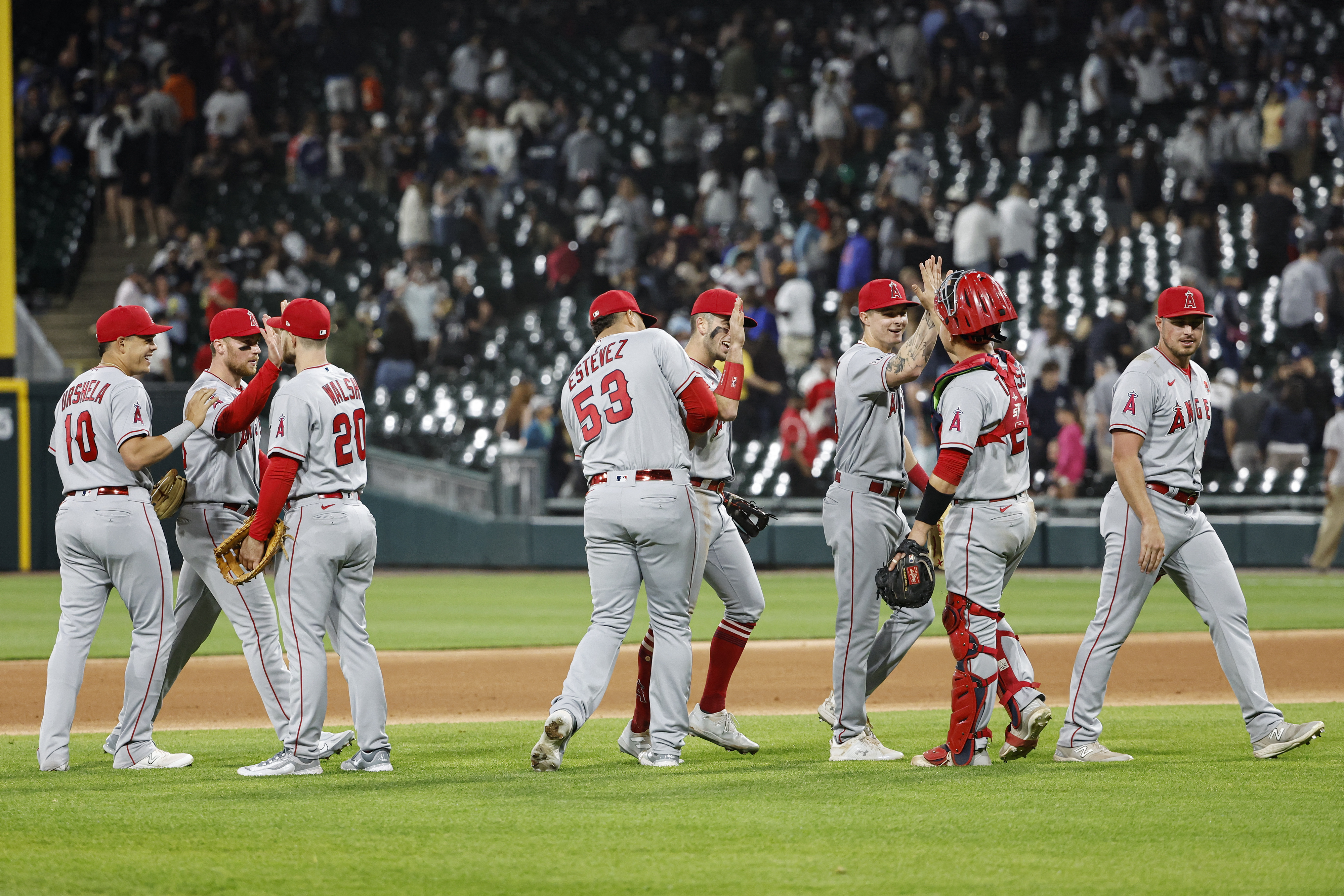 Angels set tone early, hold on to beat White Sox