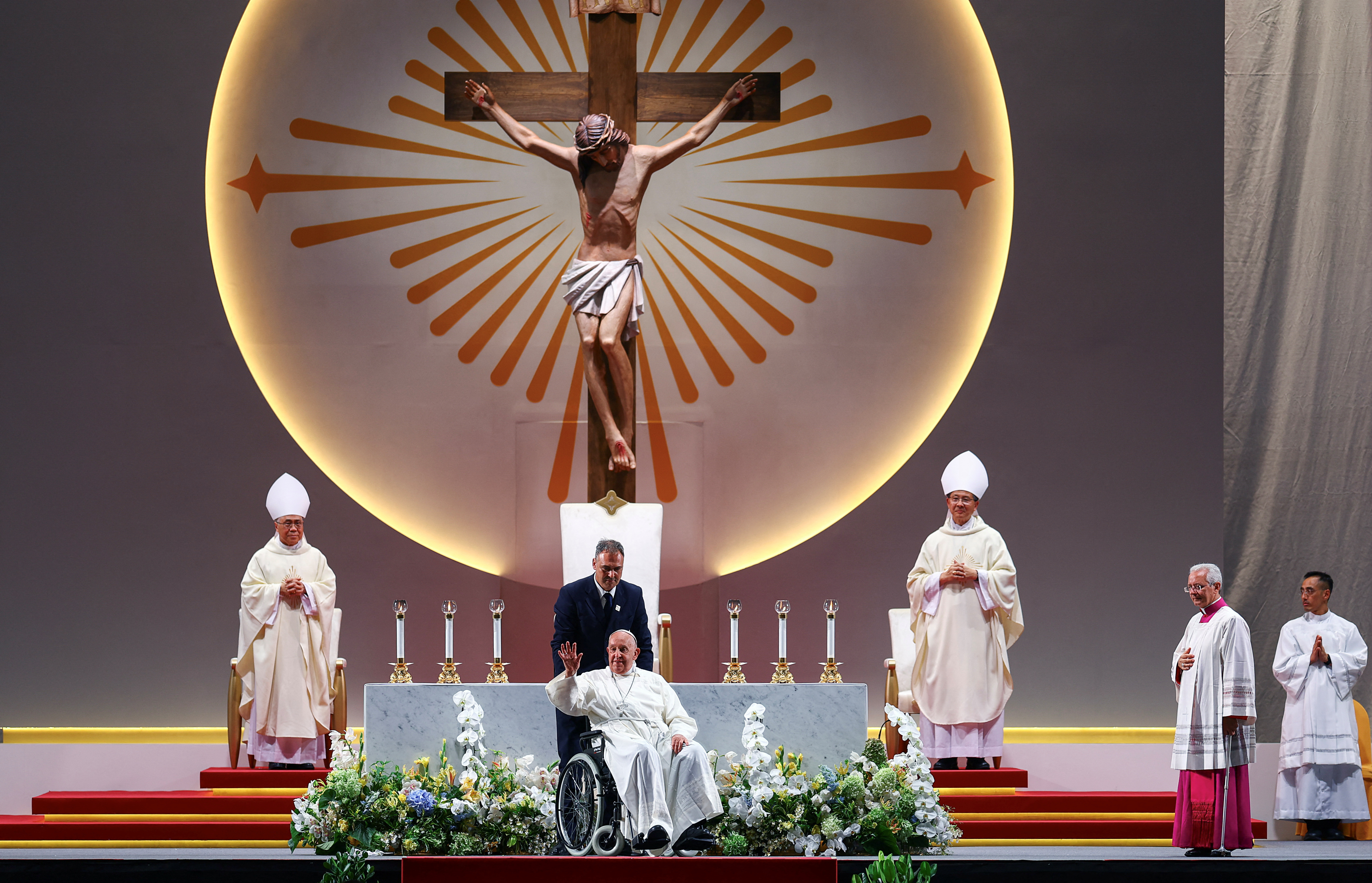 Pope Francis presides a Mass with devotees at the National Stadium in Singapore