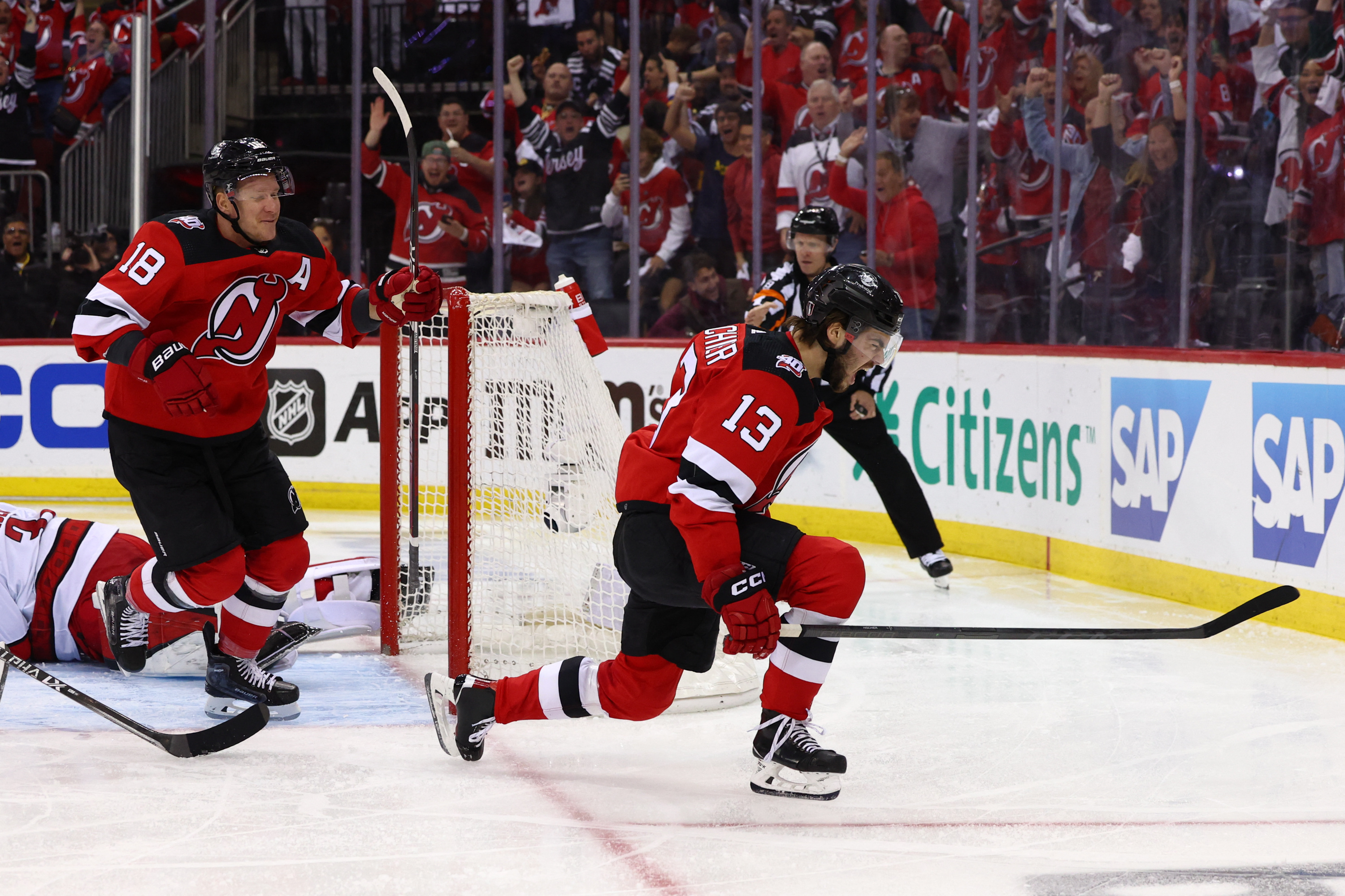 Devils erupt for 8 goals, trim Hurricanes' series lead to 2-1 | Reuters