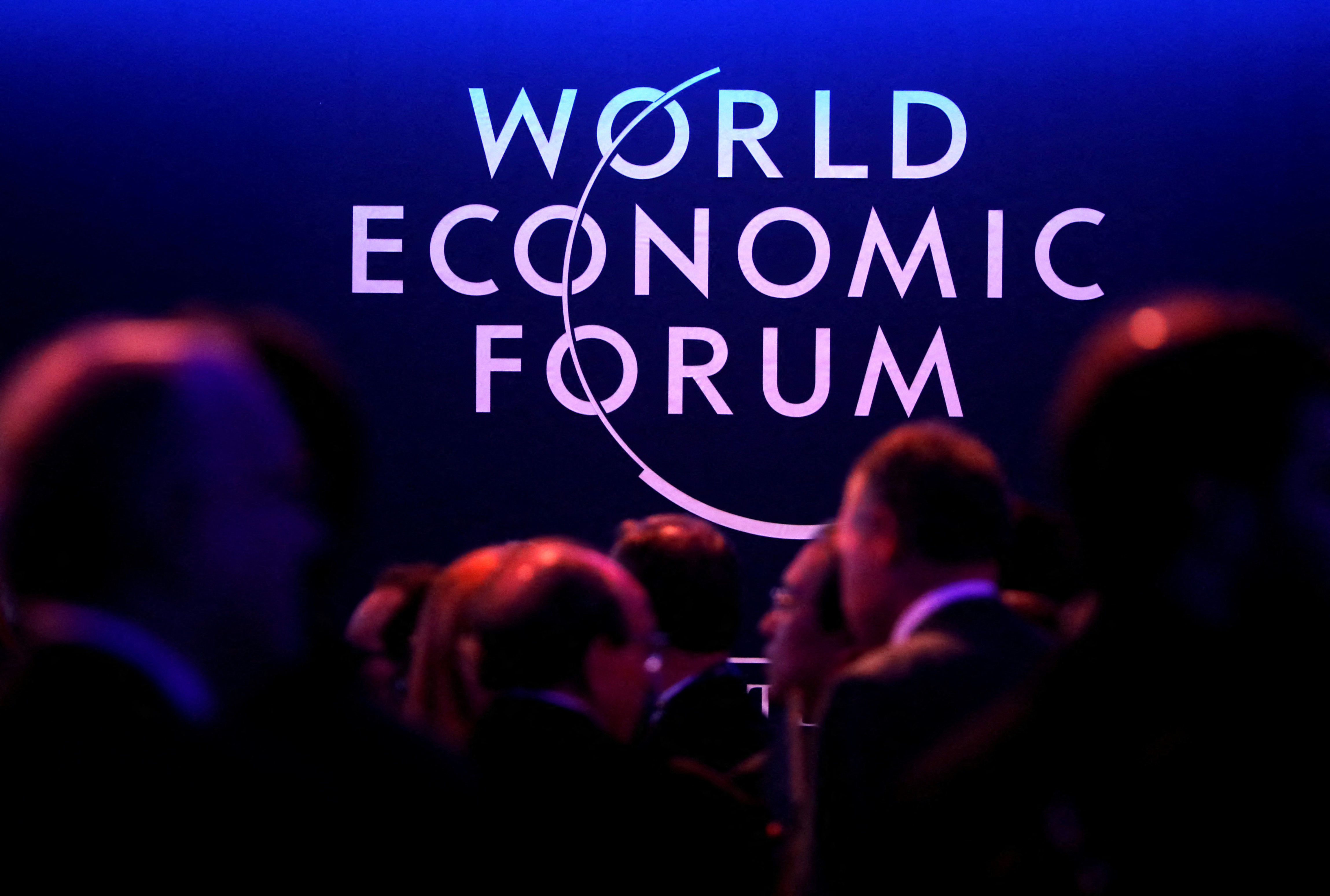 Logo of the World Economic Forum (WEF) is seen as people attend the WEF annual meeting in Davos