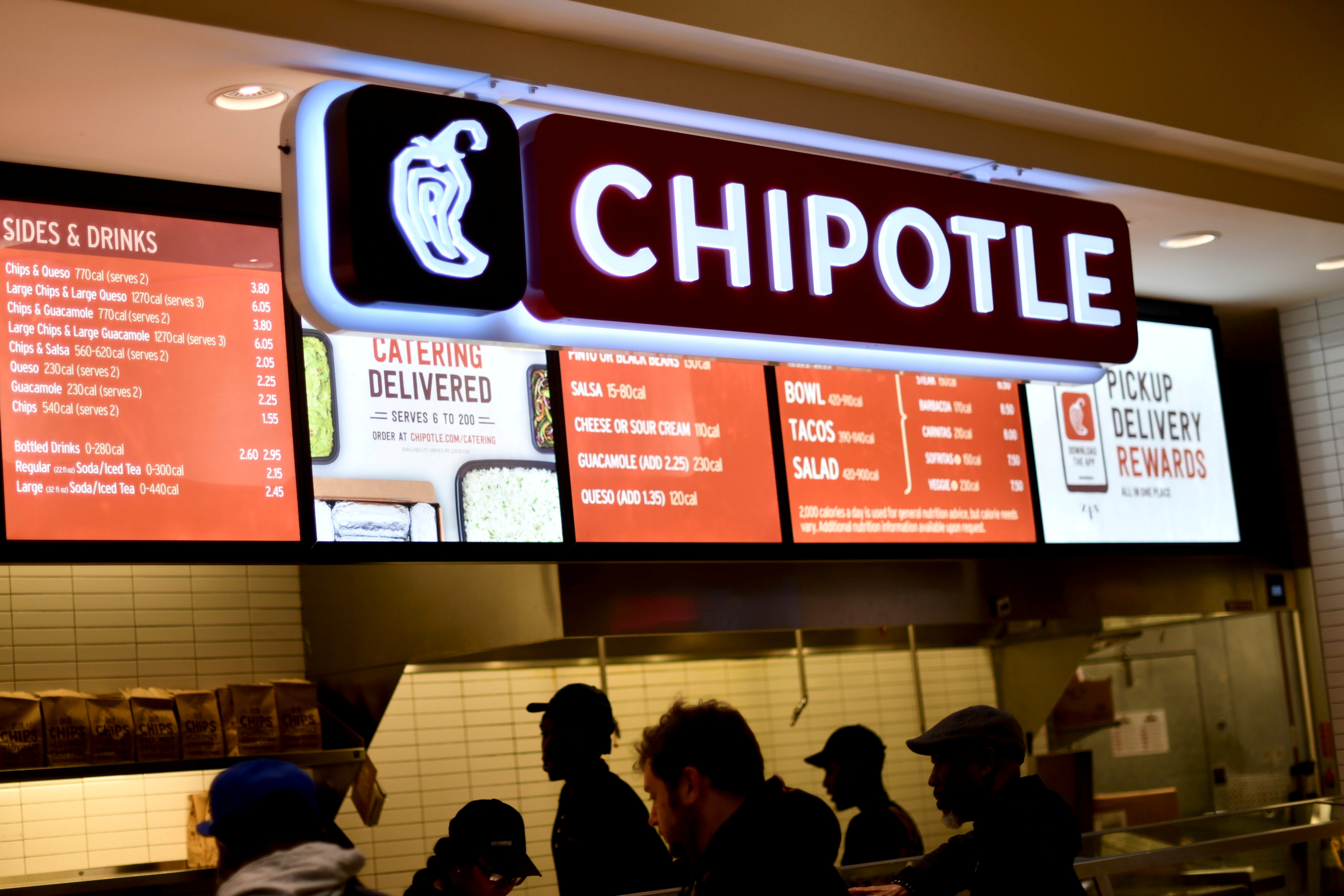 Customers order from a Chipotle restaurant at the King of Prussia Mall in King of Prussia