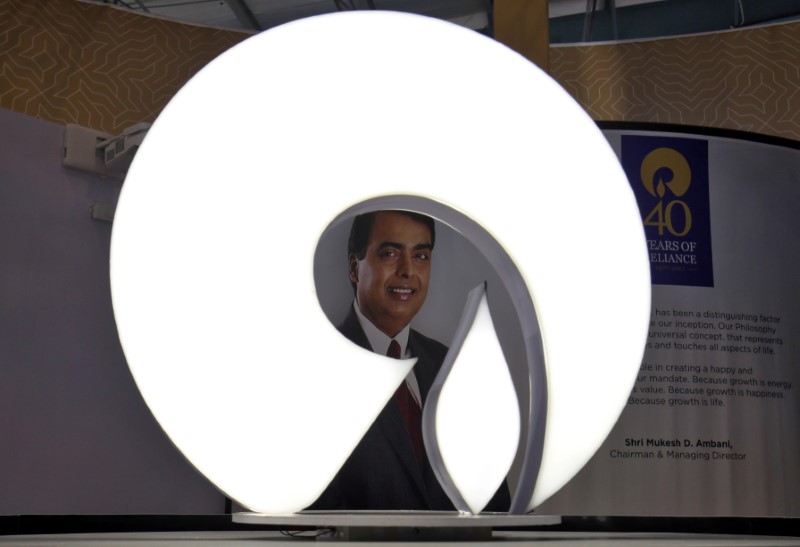The logo of Reliance Industries is pictured in a stall at the Vibrant Gujarat Global Trade Show at Gandhinagar, India, January 17, 2019. REUTERS/Amit Dave