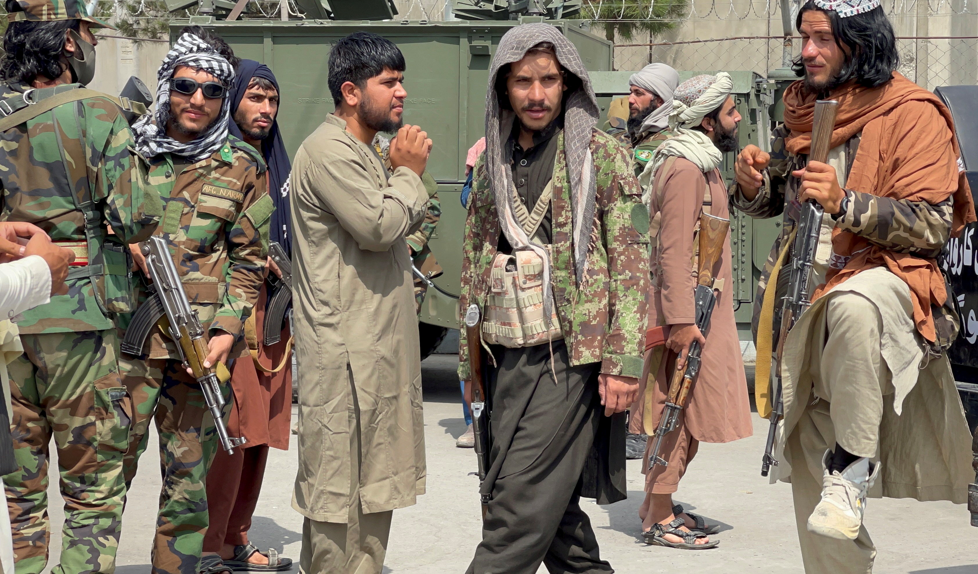Taliban forces patrol at a runway a day after U.S troops withdrawal from Hamid Karzai International Airport in Kabul