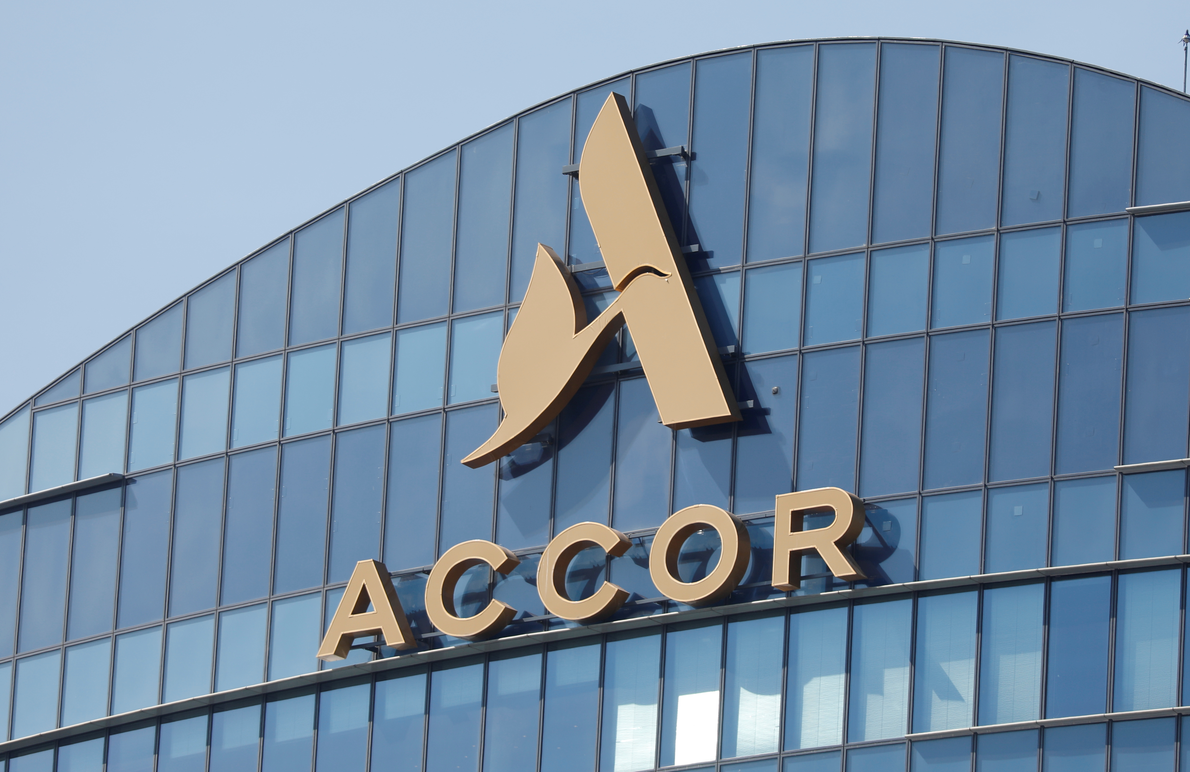 The logo of French hotel operator AccorHotels is seen on top of the building company's headquarters in Issy-les-Moulineaux near Paris, France, May 27, 2020.  REUTERS/Charles Platiau