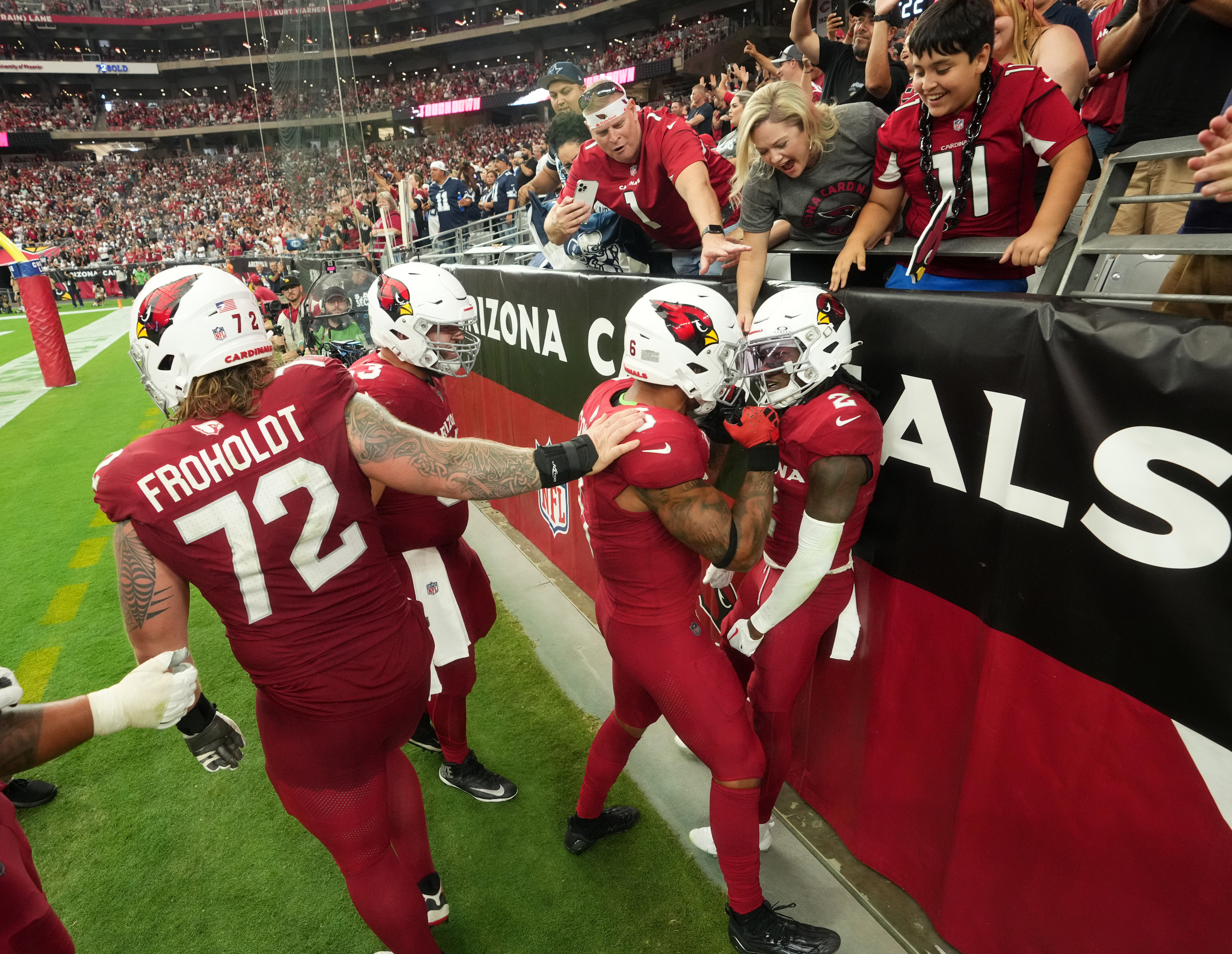 Arizona Cardinals mascot Big Red celebrates a touchdown against