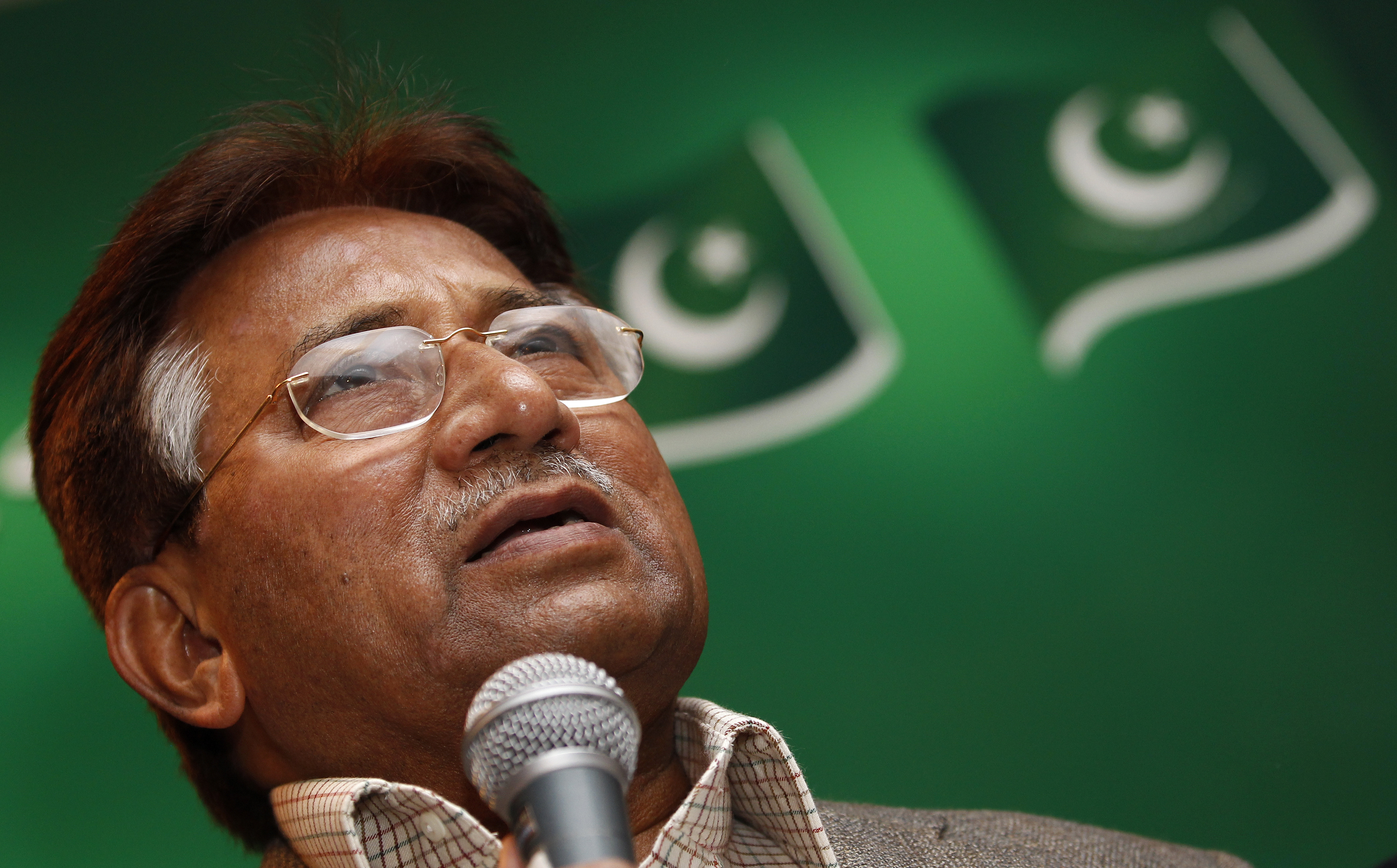 The former President of Pakistan, Pervez Musharraf,  speaks at a news conference at a branch of his political party in east London
