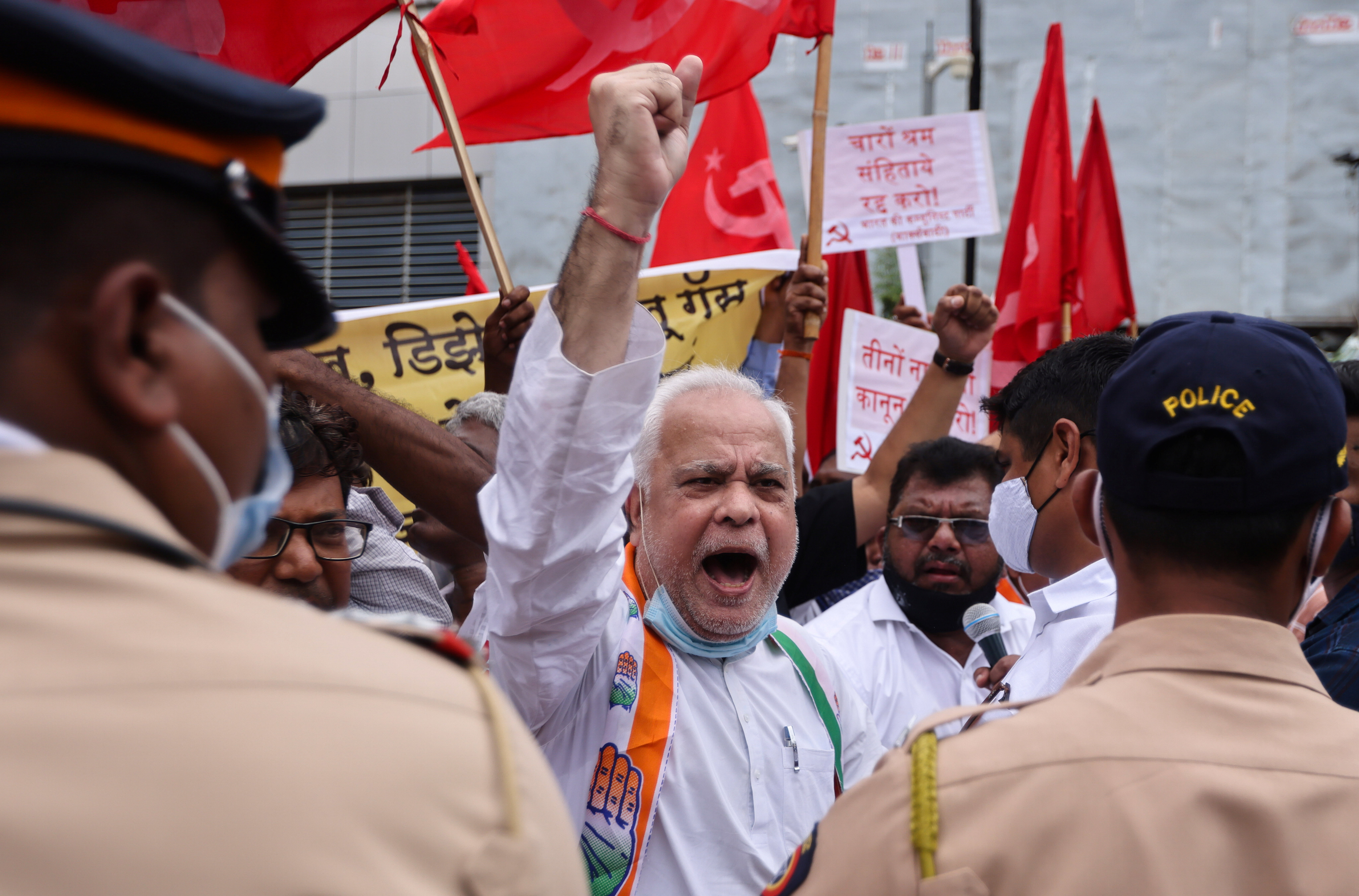 Members of the Indian National Congress (INC) political party protest against farm laws during a nationwide strike, in Mumbai, India, September 27, 2021. REUTERS/Francis Mascarenhas