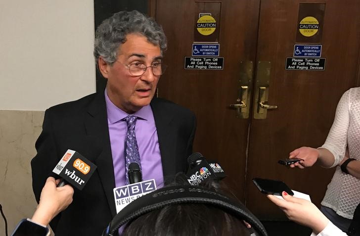 Retired Massachusetts physician Kligler, a plaintiff in a right-to-die lawsuit, speaks to reporters outside a courtroom in Suffolk County Superior Court in Boston