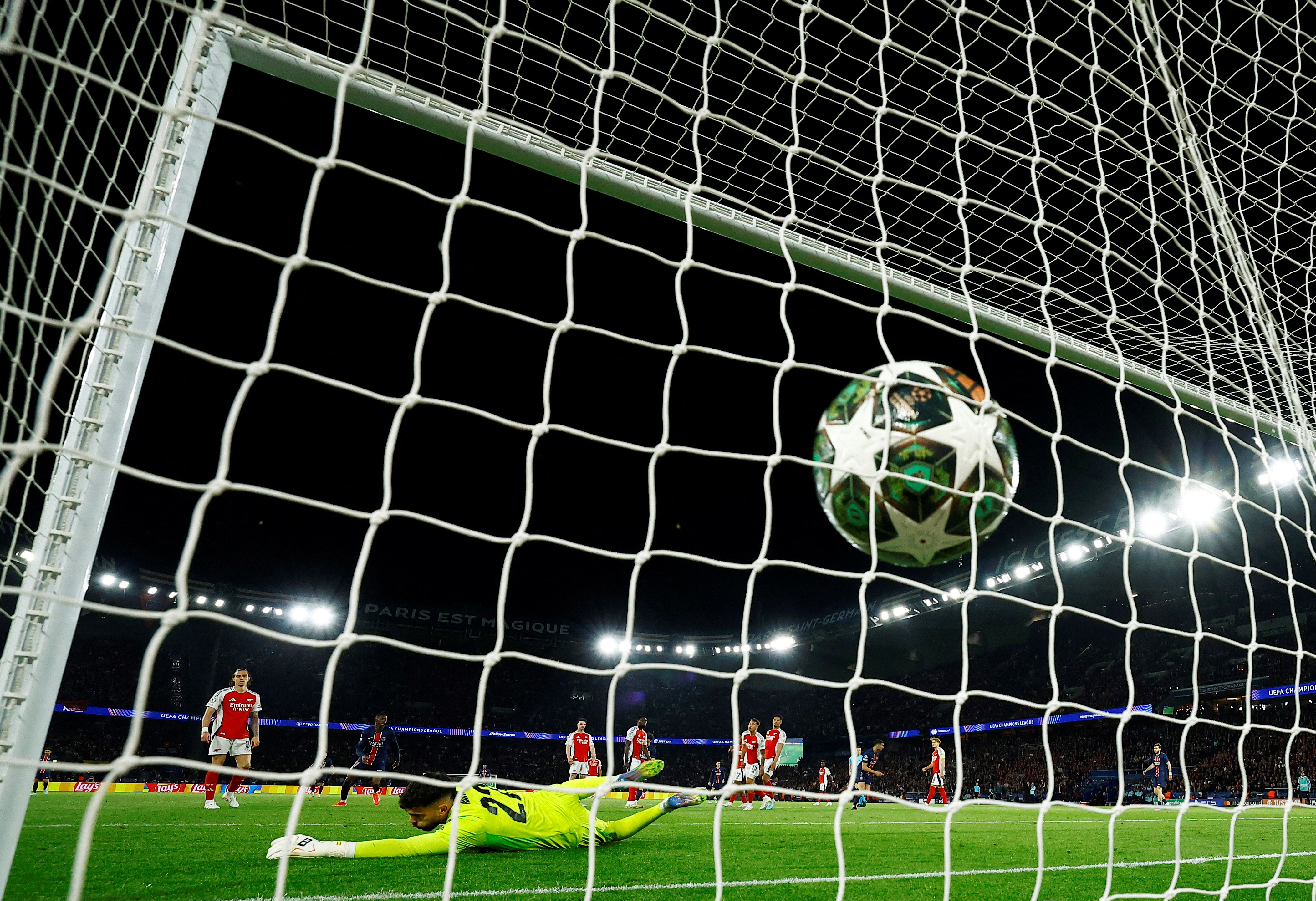 PSG see off Arsenal to earn second shot at Champions League title | Reuters