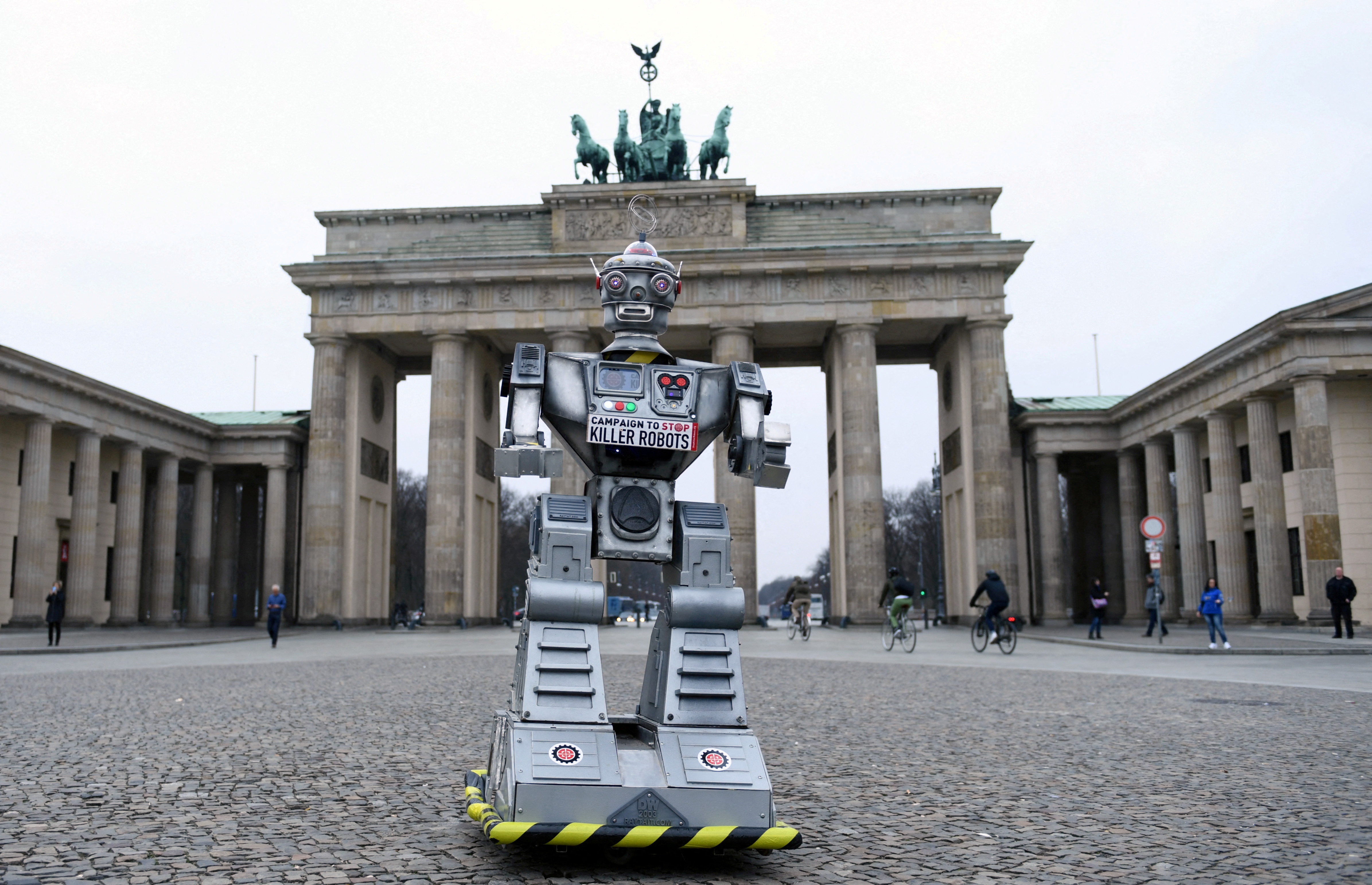 A robot is pictured as activists from the Campaign to Stop Killer Robots, a coalition of non-governmental organisations opposing lethal autonomous weapons or so-called 'killer robots', stage a protest at Brandenburg Gate in Berlin
